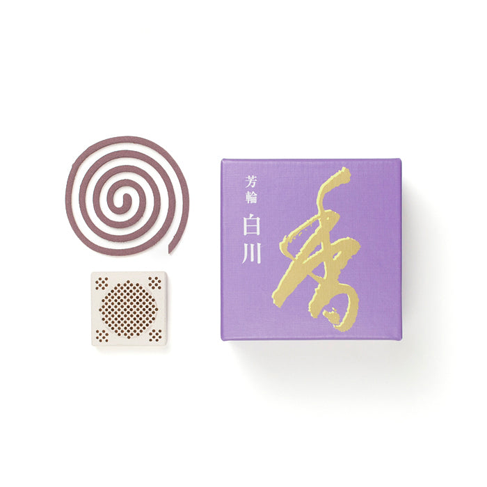 Horin White River incense coil and ceramic holder with purple box, delivering a calming sandalwood aroma for home and garden decor.