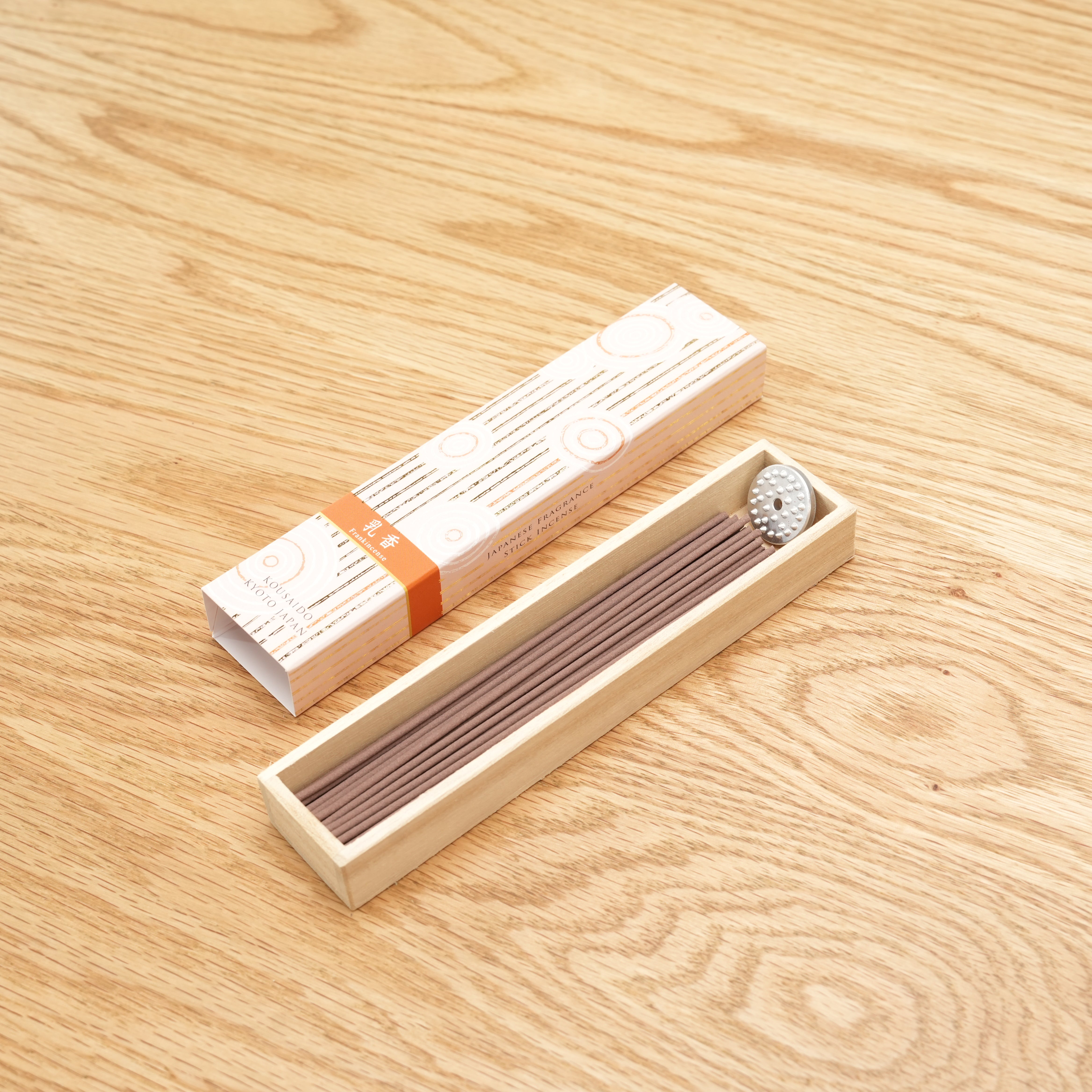 Hyakuranko Frankincense Incense Stick set with 40 long sticks and metal holder in a wooden tray, ideal for home fragrance and spiritual decor.