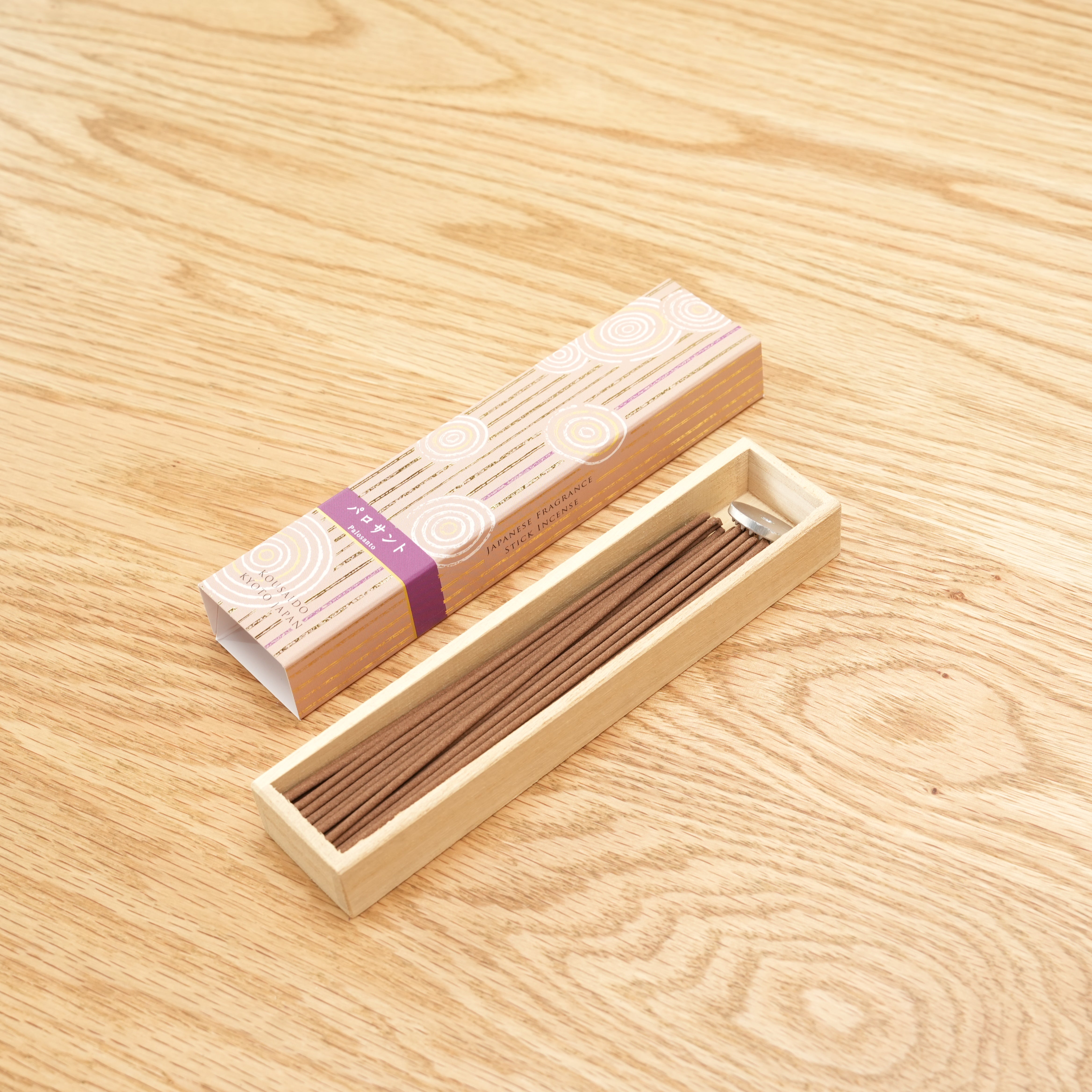 Hyakuranko Palosanto Incense Stick in a wooden tray. Long natural incense ideal for home fragrance.