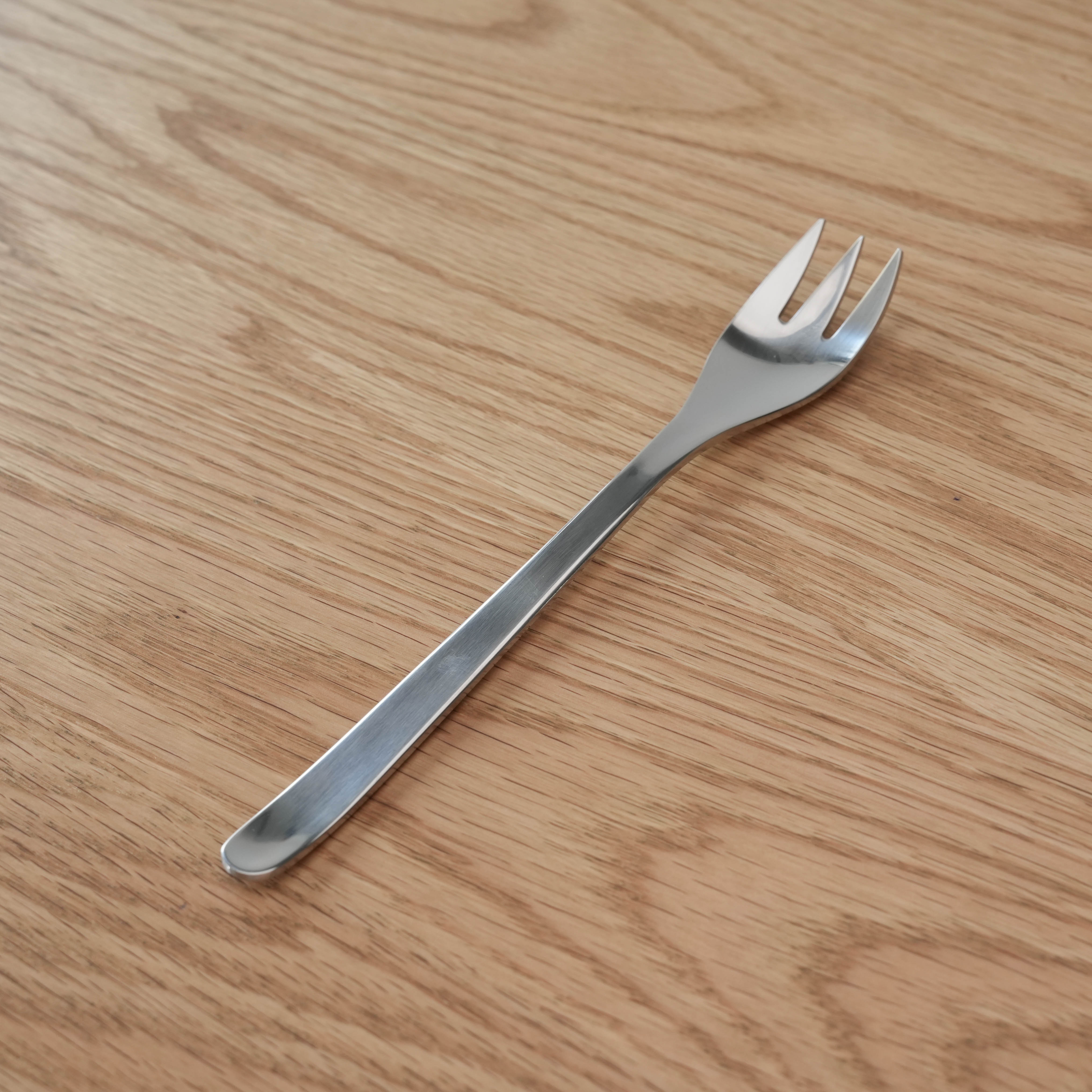Sori Yanagi stainless steel table fork with a minimalist Japanese design. Ideal for modern kitchen and dining settings.