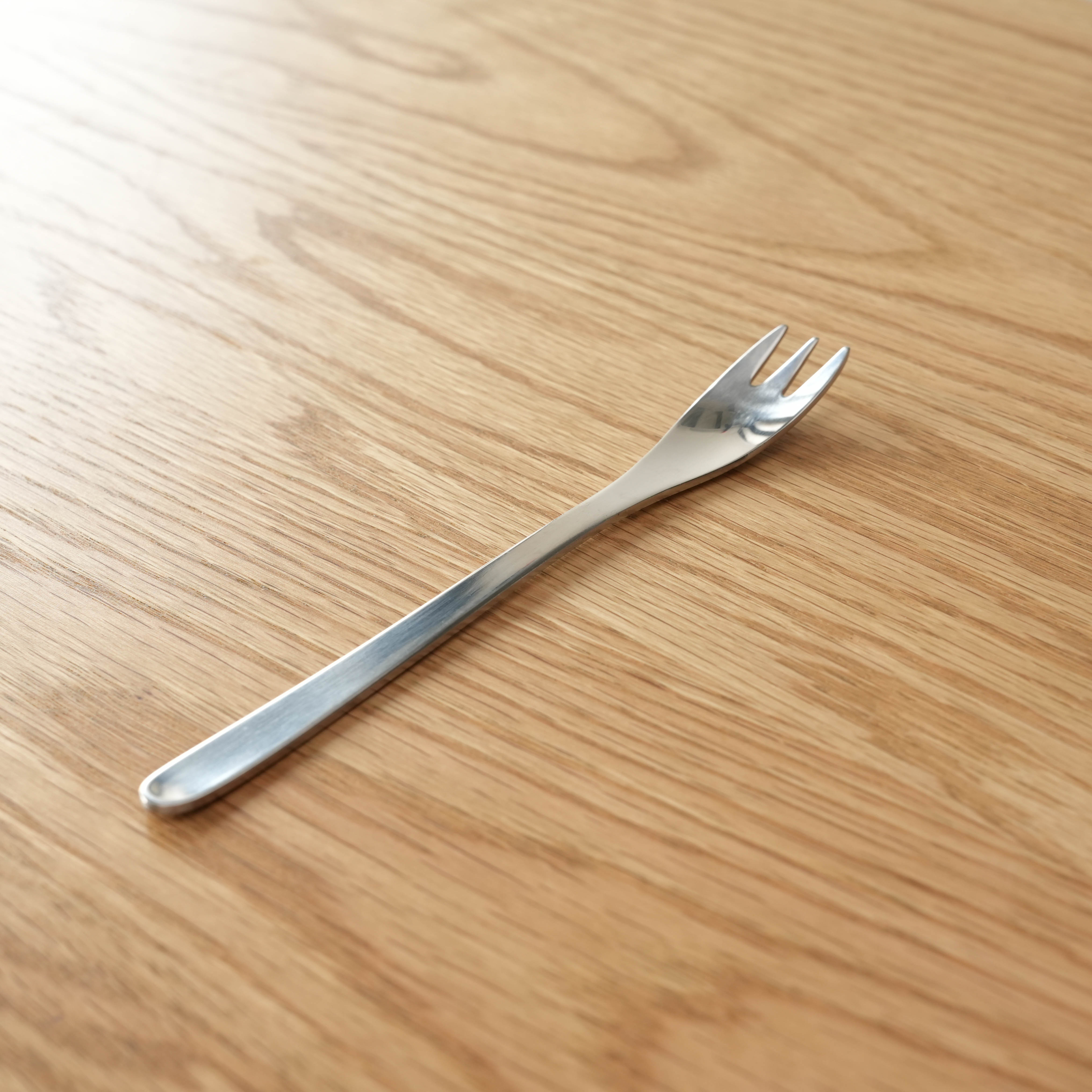 Sori Yanagi Cake Fork - Stainless Steel with minimalist Japanese design, ideal for desserts. Features angled tines and a balanced handle.