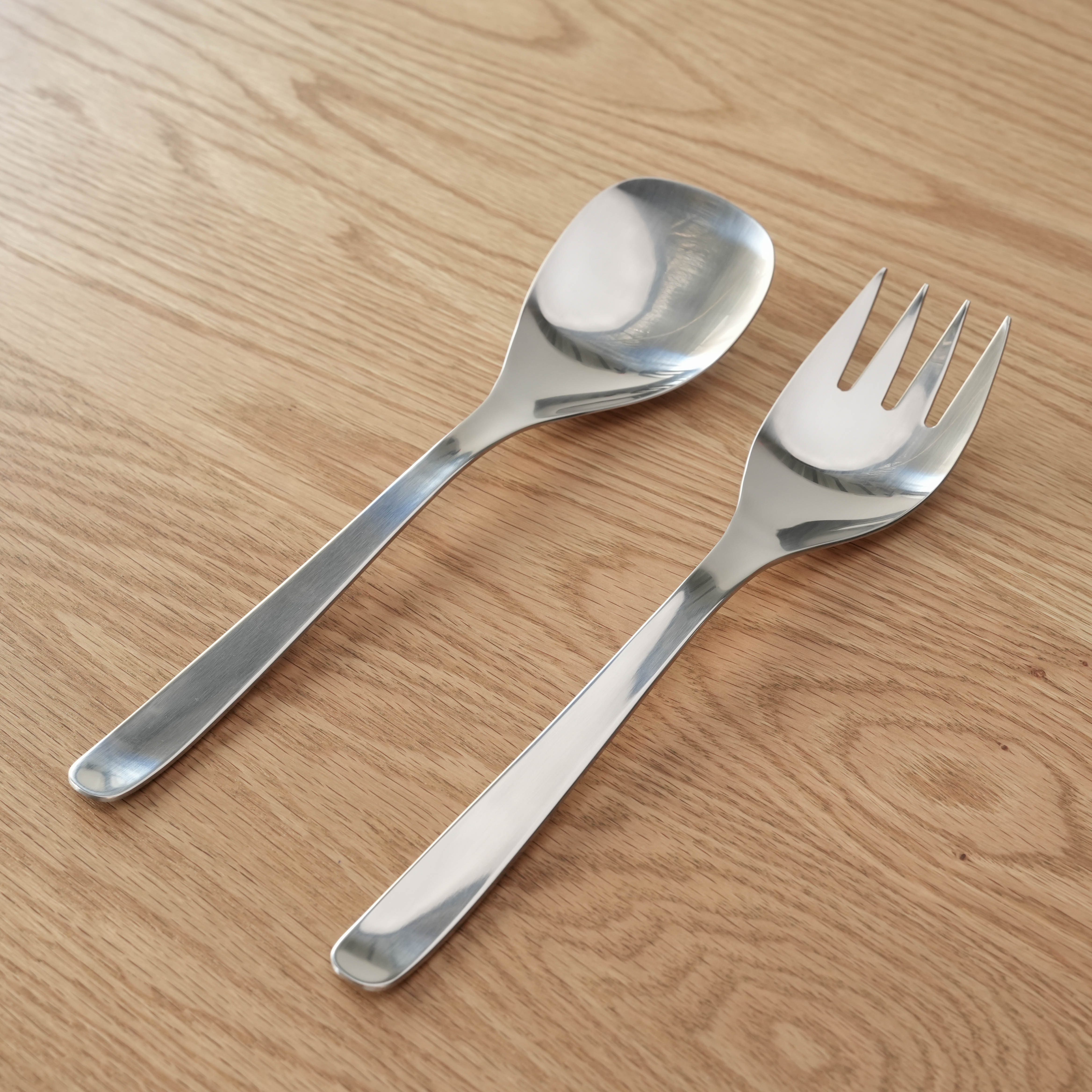 Sori Yanagi Serving Fork and matching spoon set in stainless steel, 24.8cm, perfect for coordinated serving in contemporary kitchens.