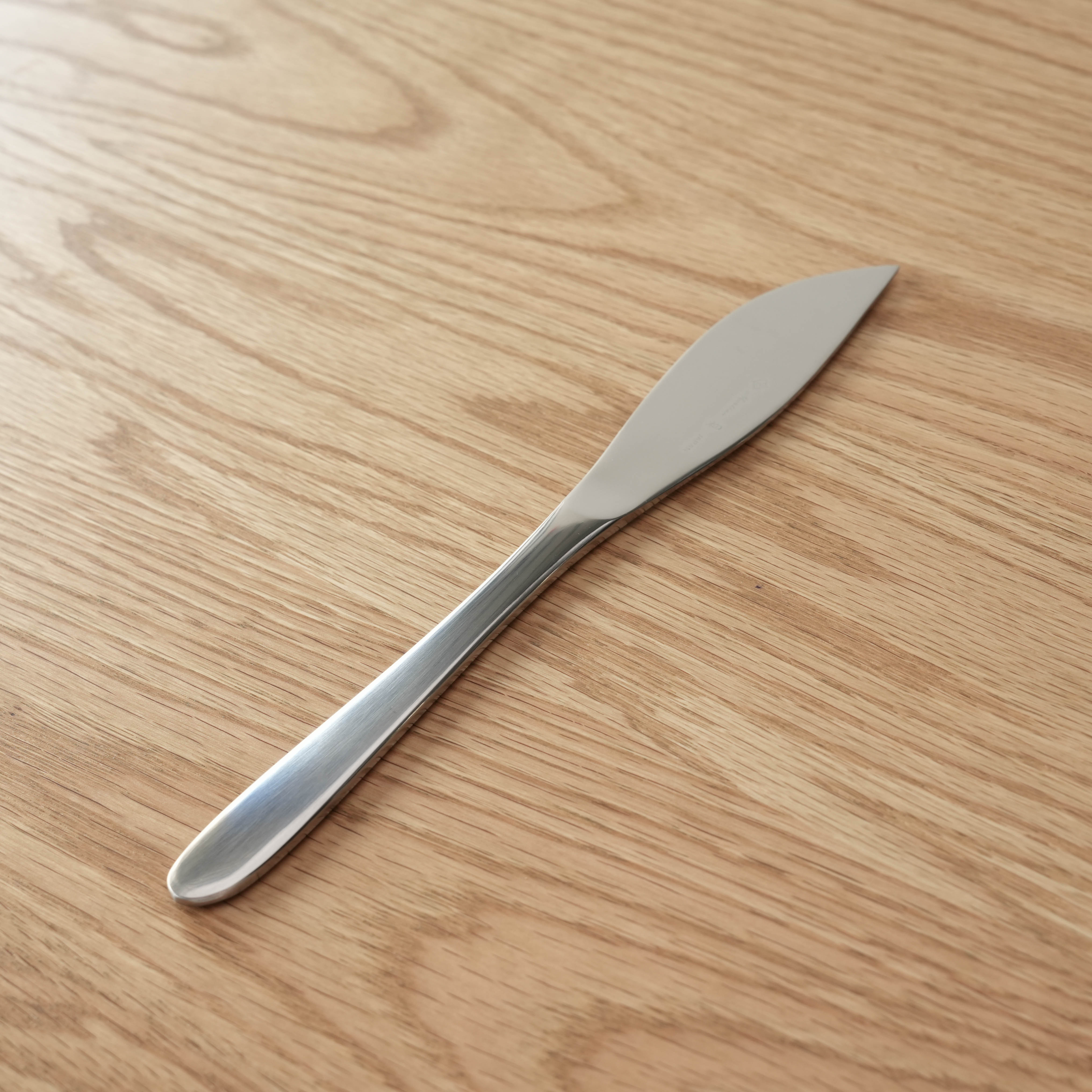 Sori Yanagi Dessert Knife in stainless steel with sleek, modern design. Dishwasher safe and ideal for elegant table settings.