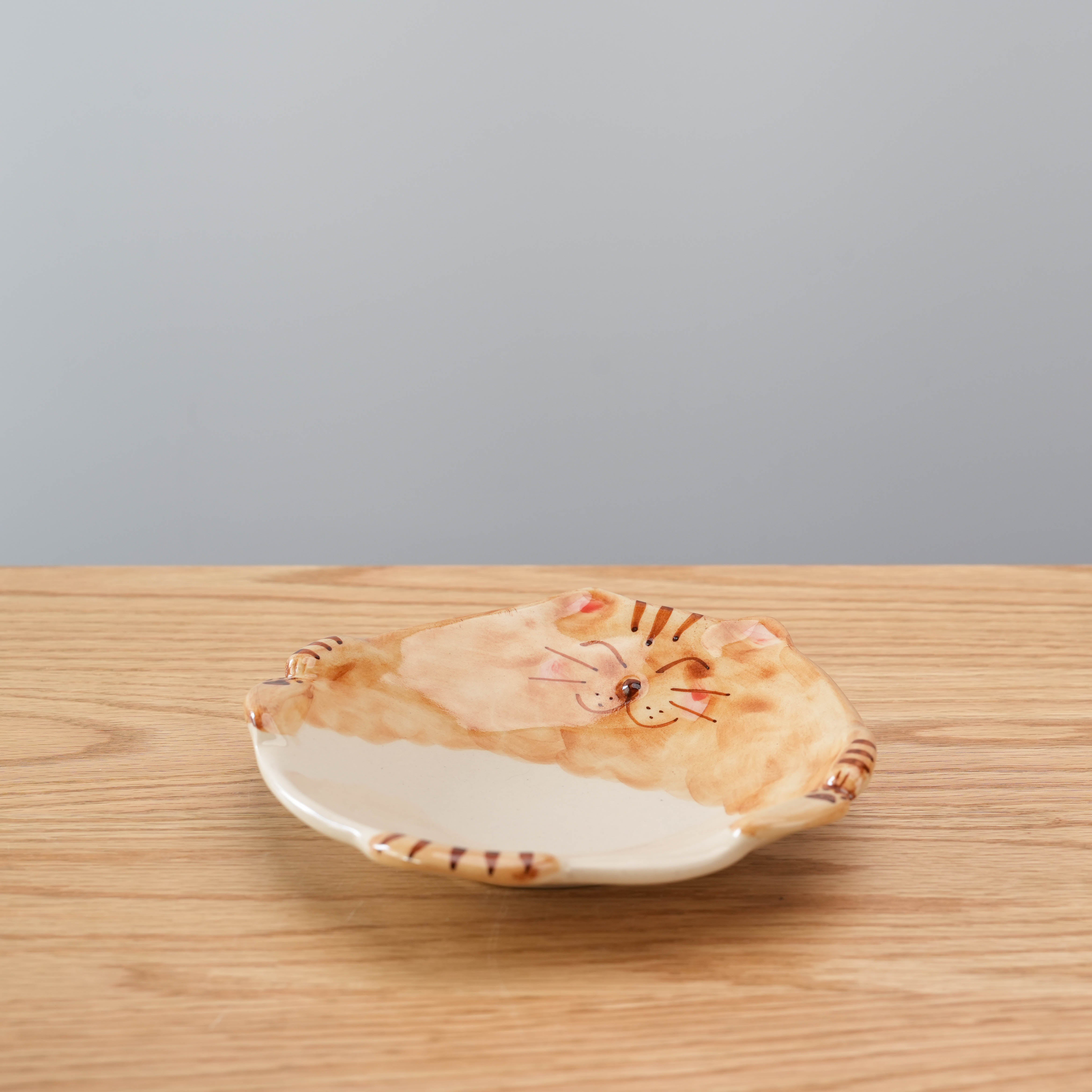 Hasami Ware Cat Plate - Brown Tiger|Japanese Design featuring a hand-painted lucky cat face with striped ears and paws, ideal for charming table settings.