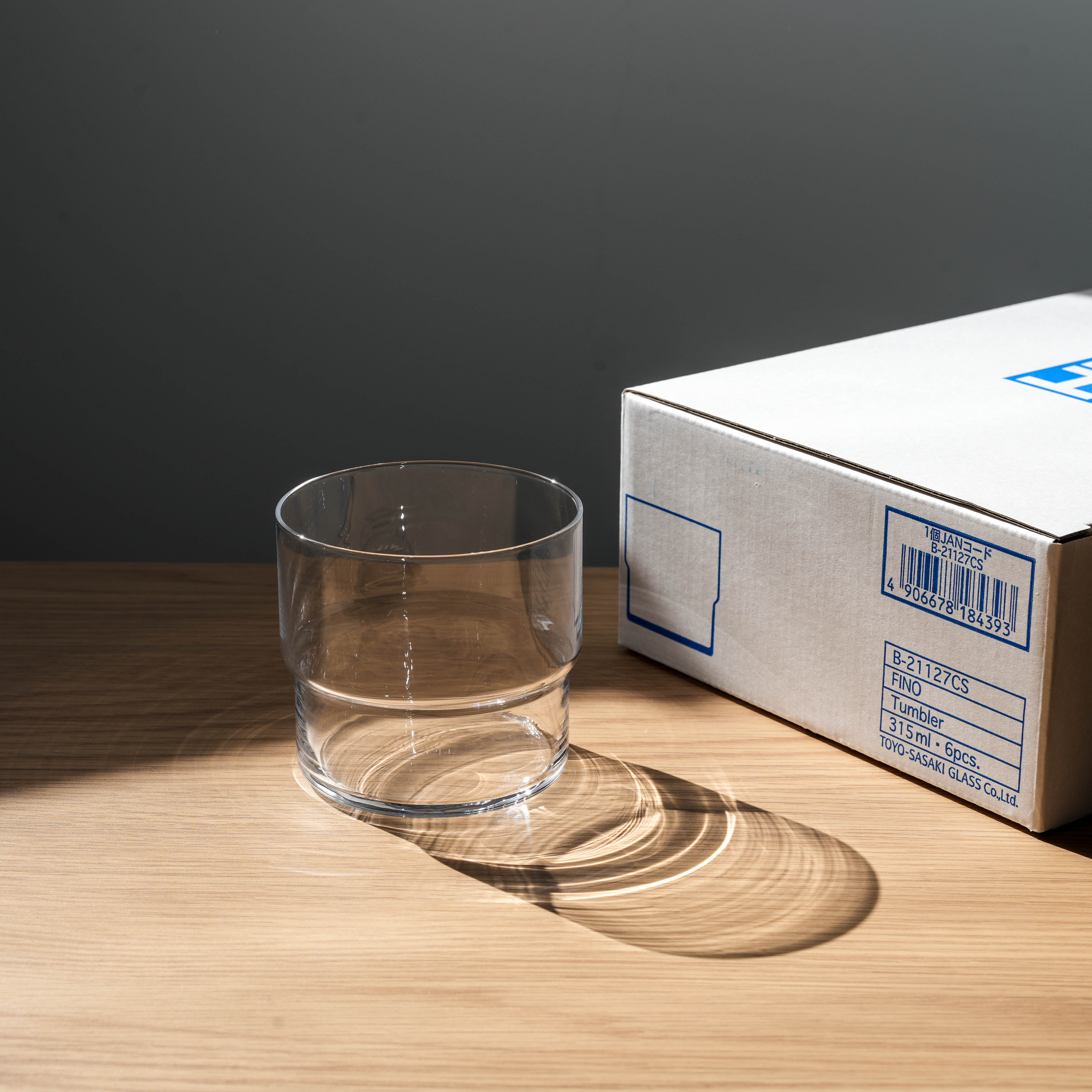 Toyo-Sasaki HS Fino Tumbler beside branded packaging box, highlighting durable, stackable design ideal for modern kitchens and restaurants.