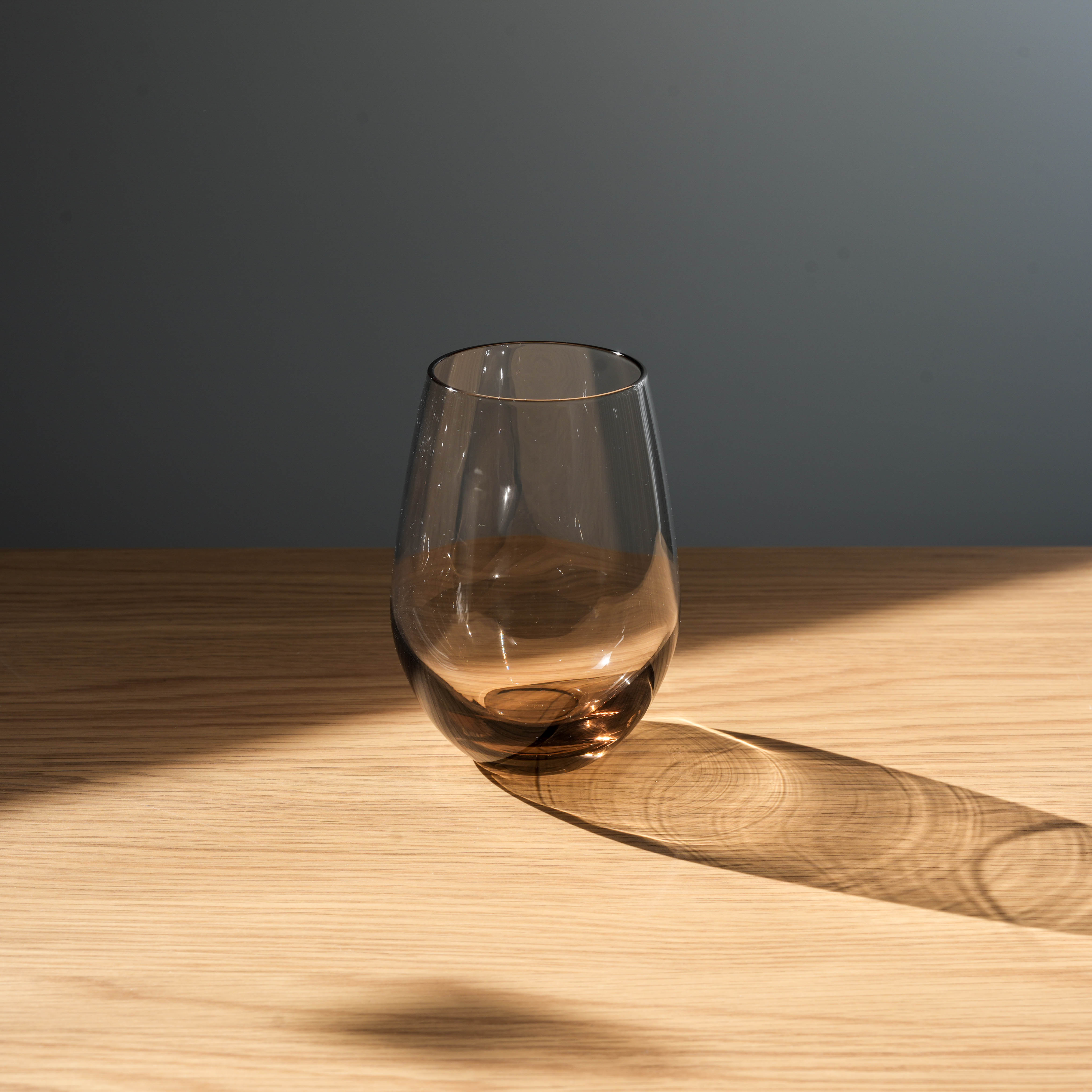 Smoke-tinted Toyo-Sasaki Glass Tumbler from the award-winning HS Water Variation Set, showcasing elegant Japanese design.
