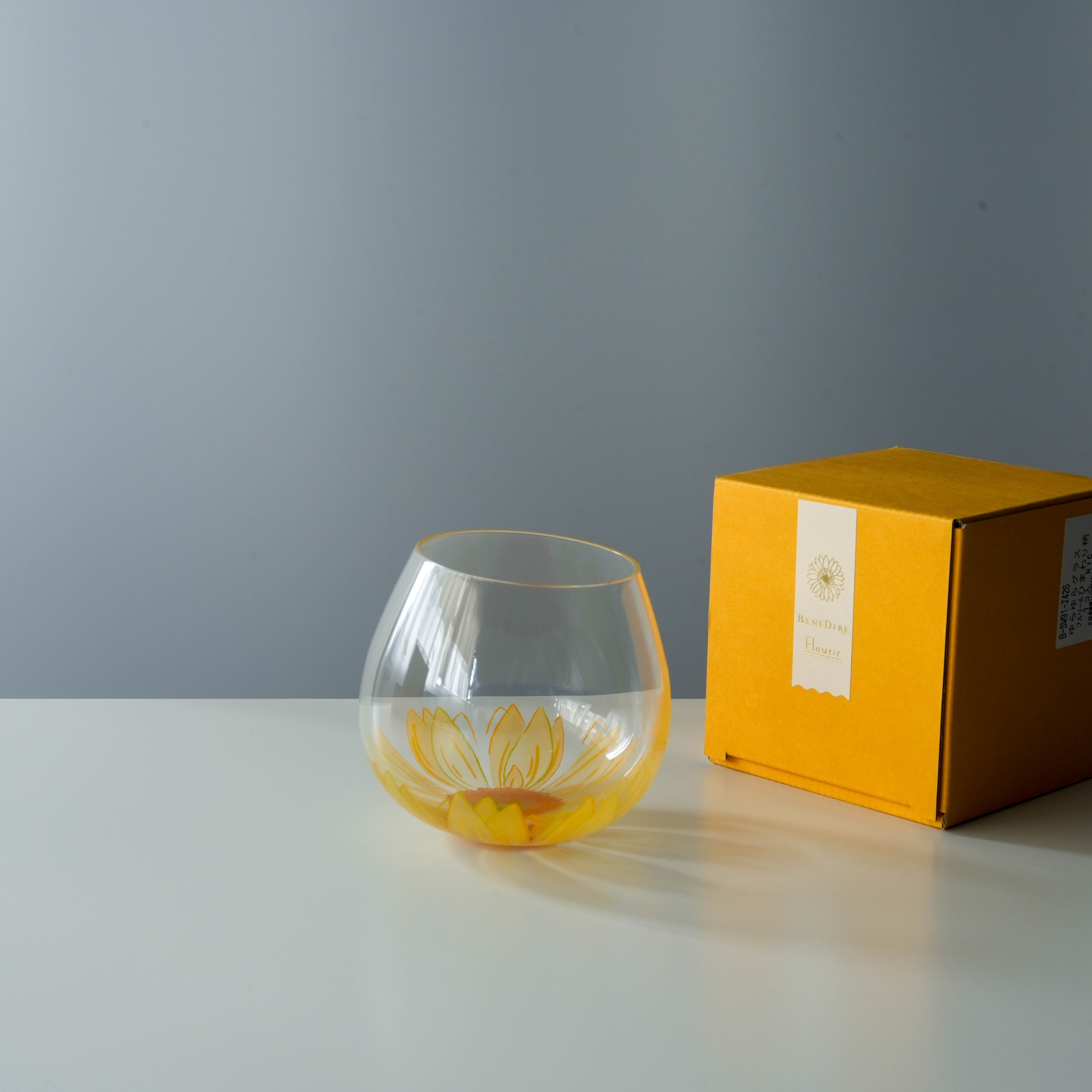 Toyo-Sasaki Tumbler - Fleurir Glass with yellow Gerbera design, shown with gift box. Made in Japan, ideal for gifting or elegant drinkware.