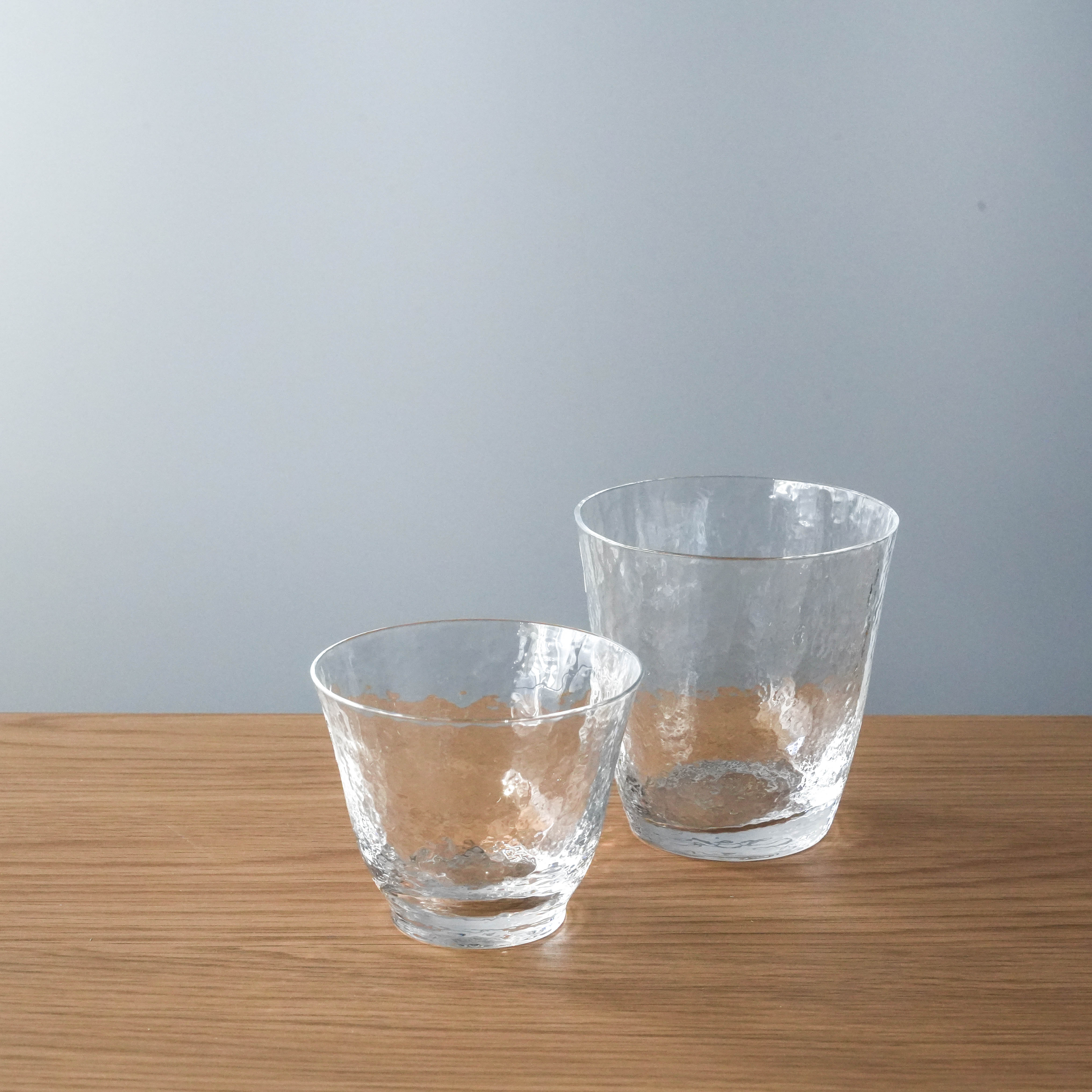 Set of Toyo-Sasaki Crystal Glass - Japanese Crystal cold tea glasses in different sizes, showcasing handcrafted hammered design.