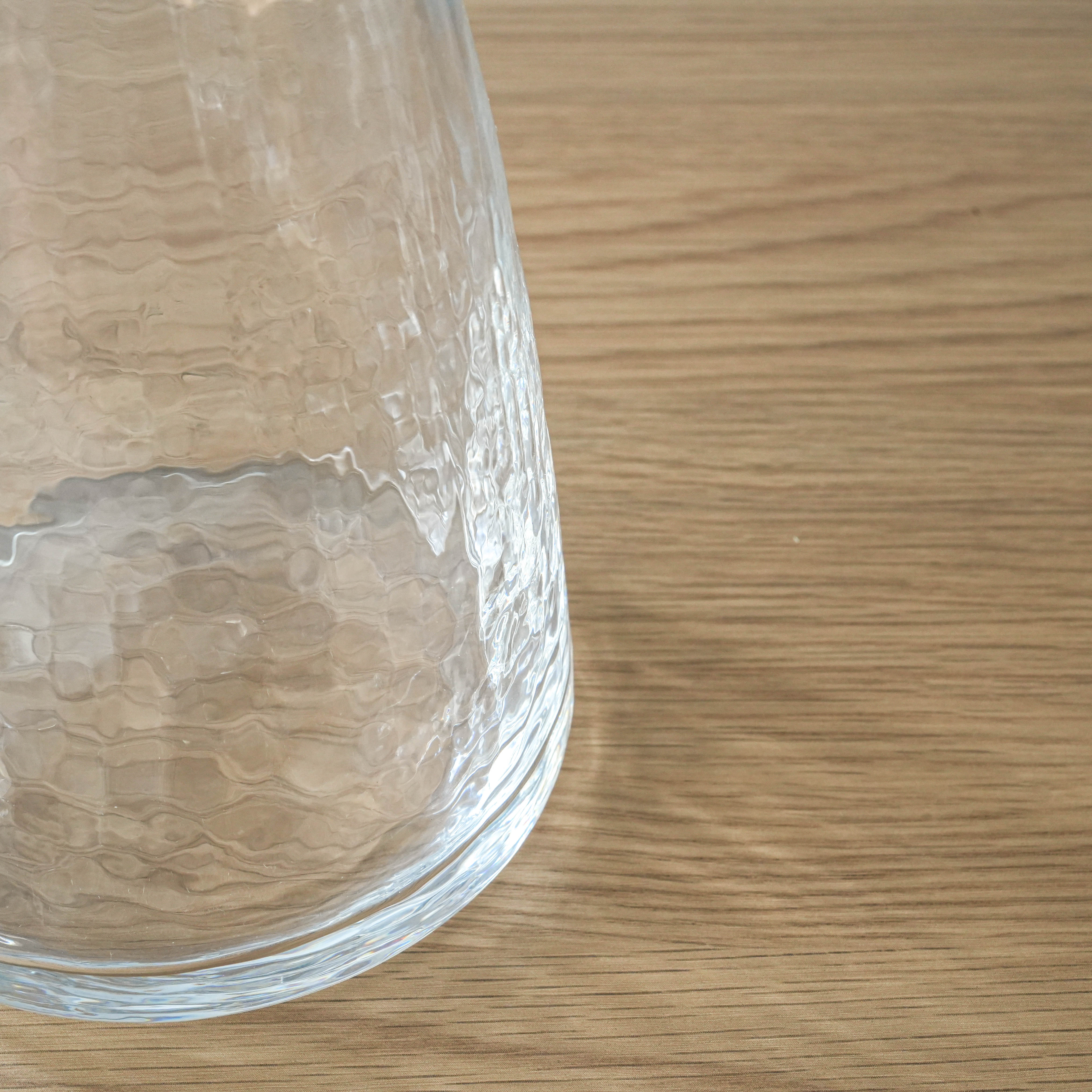 Toyo-Sasaki Carafe - Japan Glass Carafe | 800ml, Handmade. Close-up of the hammered crystal texture, showcasing artisanal craftsmanship and clarity.