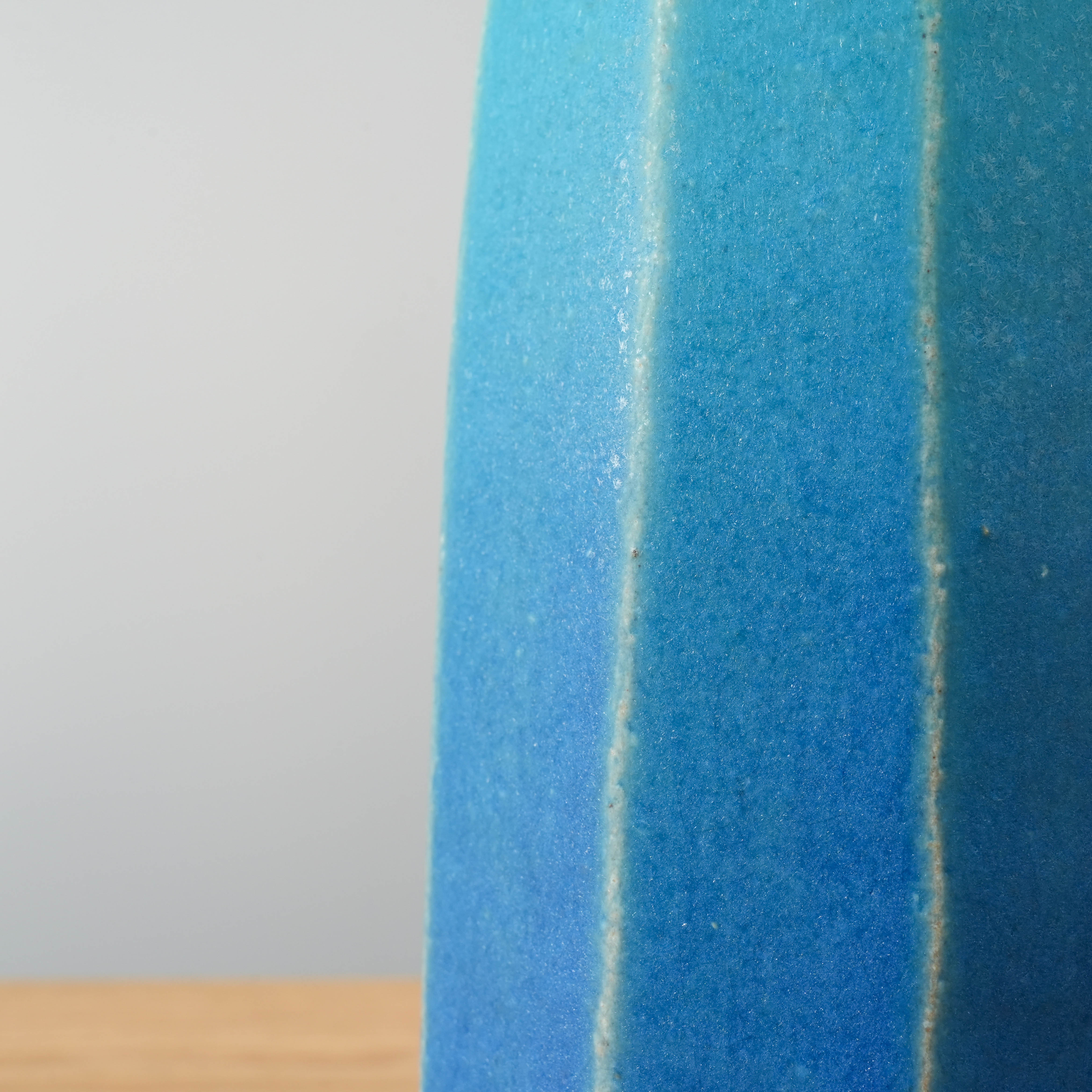 Close-up of blue Shigaraki Flower Vase from Shisui Kiln, highlighting textured ceramic surface and vertical ridge detailing.