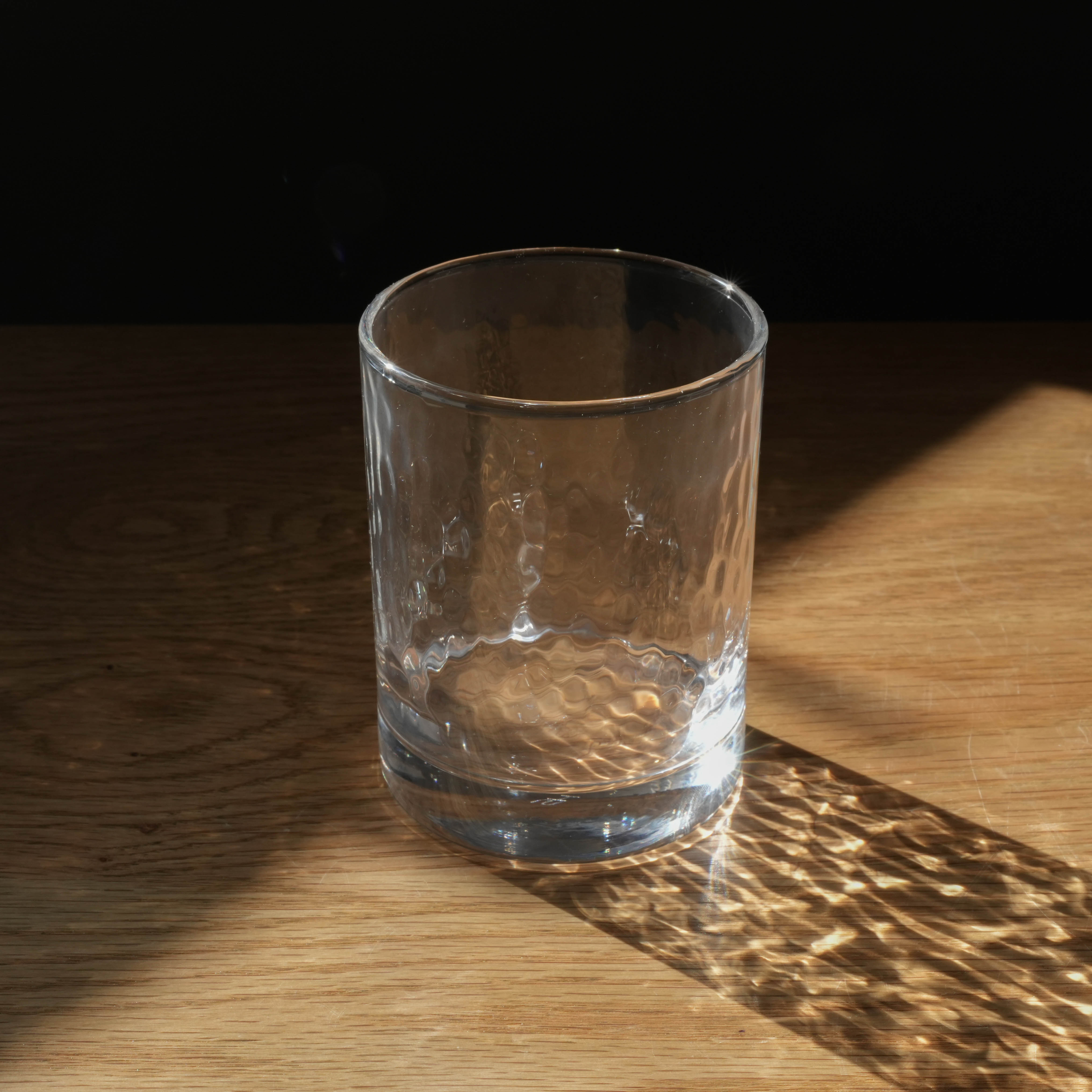 Close-up of Toyo-Sasaki HS Colorful Life tumbler highlighting its hammered texture and clarity, ideal for stylish and versatile home drinkware.