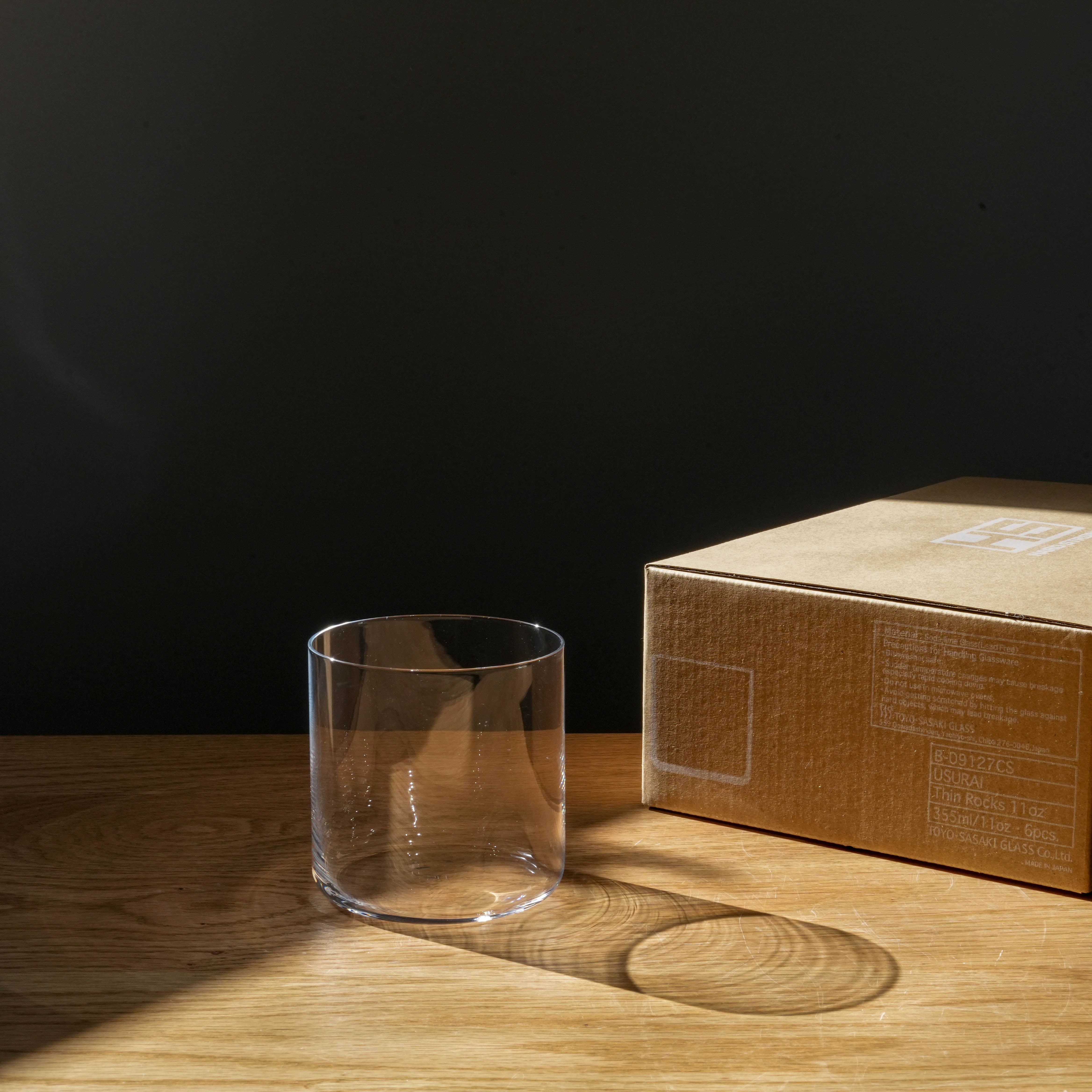Toyo-Sasaki HS Usurai Short Tumbler beside branded packaging box, highlighting its minimalist design and premium Japanese craftsmanship.