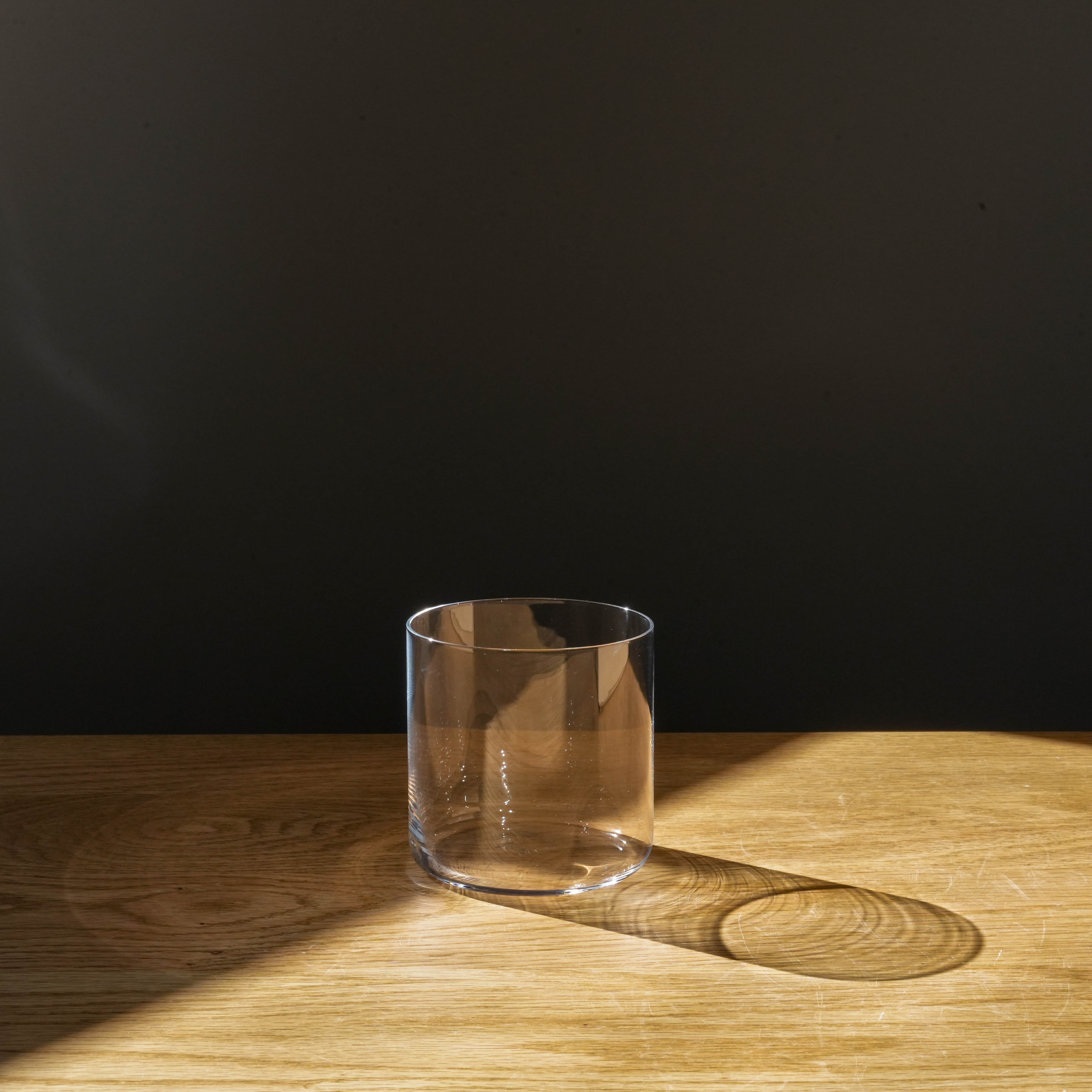 Toyo-Sasaki HS Usurai Tumbler - Japan Glassware | Thin and Versatile, shown empty on wooden surface with soft lighting, ideal for modern dining.