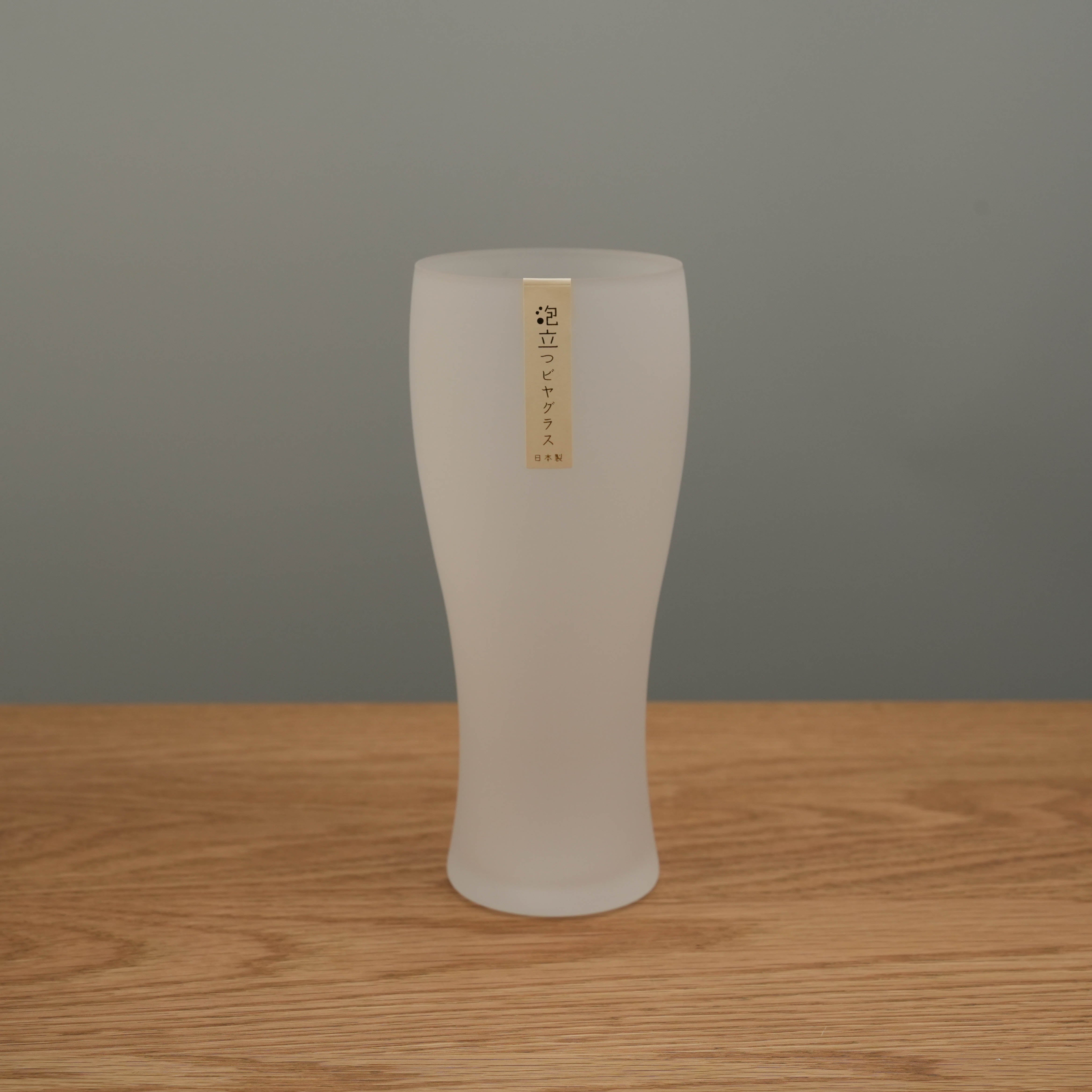 Empty Toyo-Sasaki Frosted Glass Schooner Beer Glass with a sleek matte finish, designed in Japan for optimal foam and beer enjoyment. 360ml capacity.