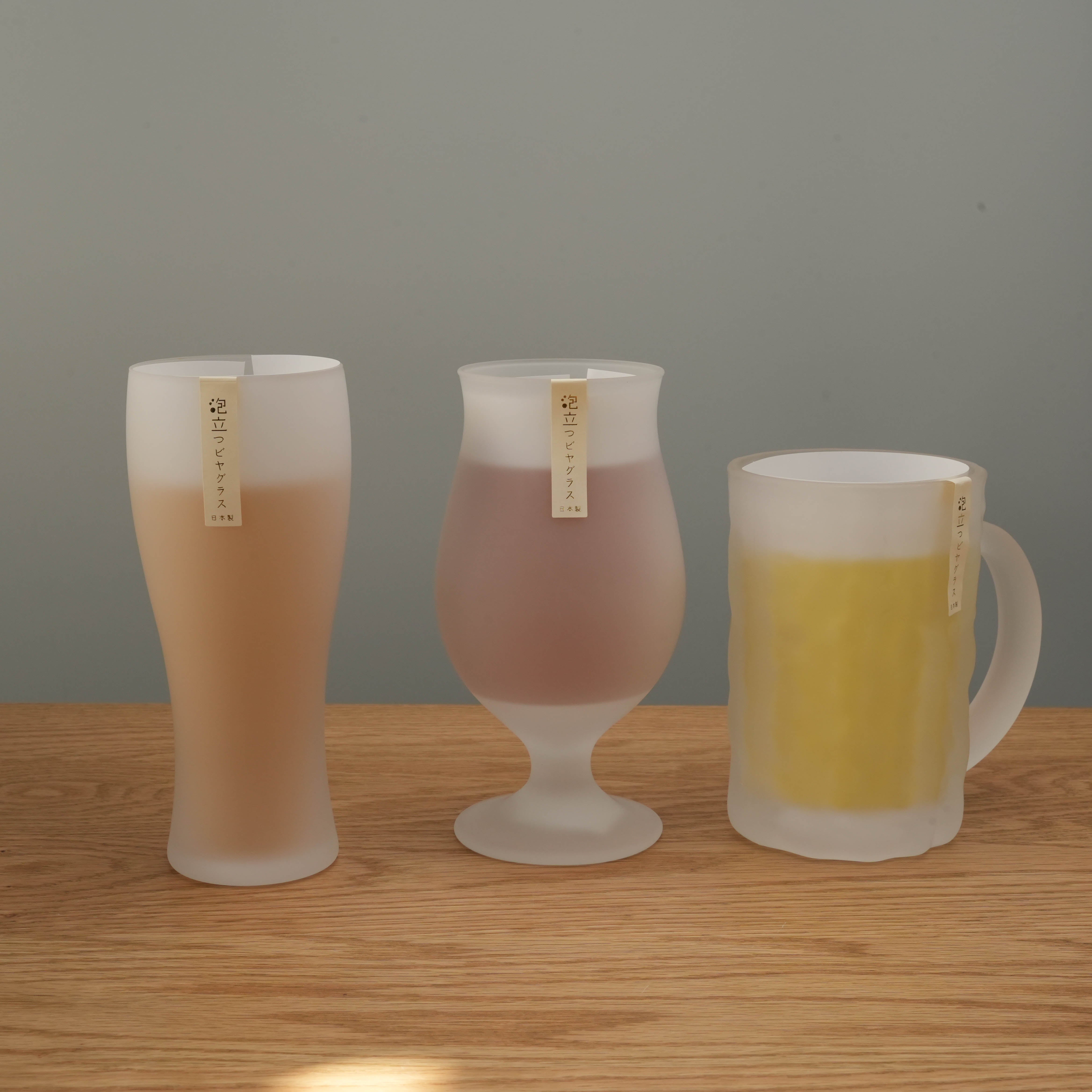 Collection of Toyo-Sasaki frosted beer glasses including schooner, tulip, and mug styles. Premium Japanese drinkware for beer lovers and collectors.