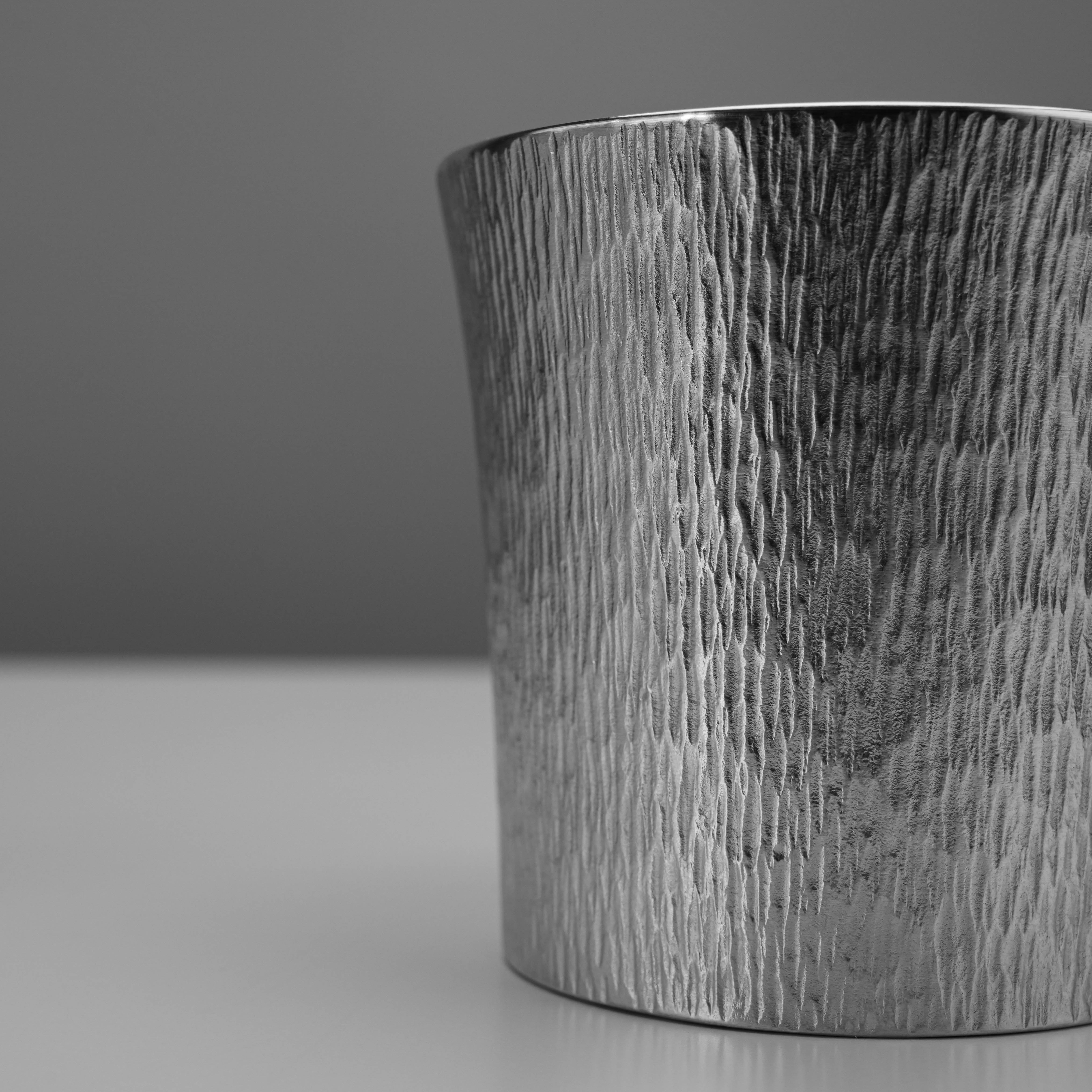 Detailed side view of the Suzuki Funnel Tumbler - Tin Tumbler emphasizing the fine vertical grain pattern and polished tin surface.