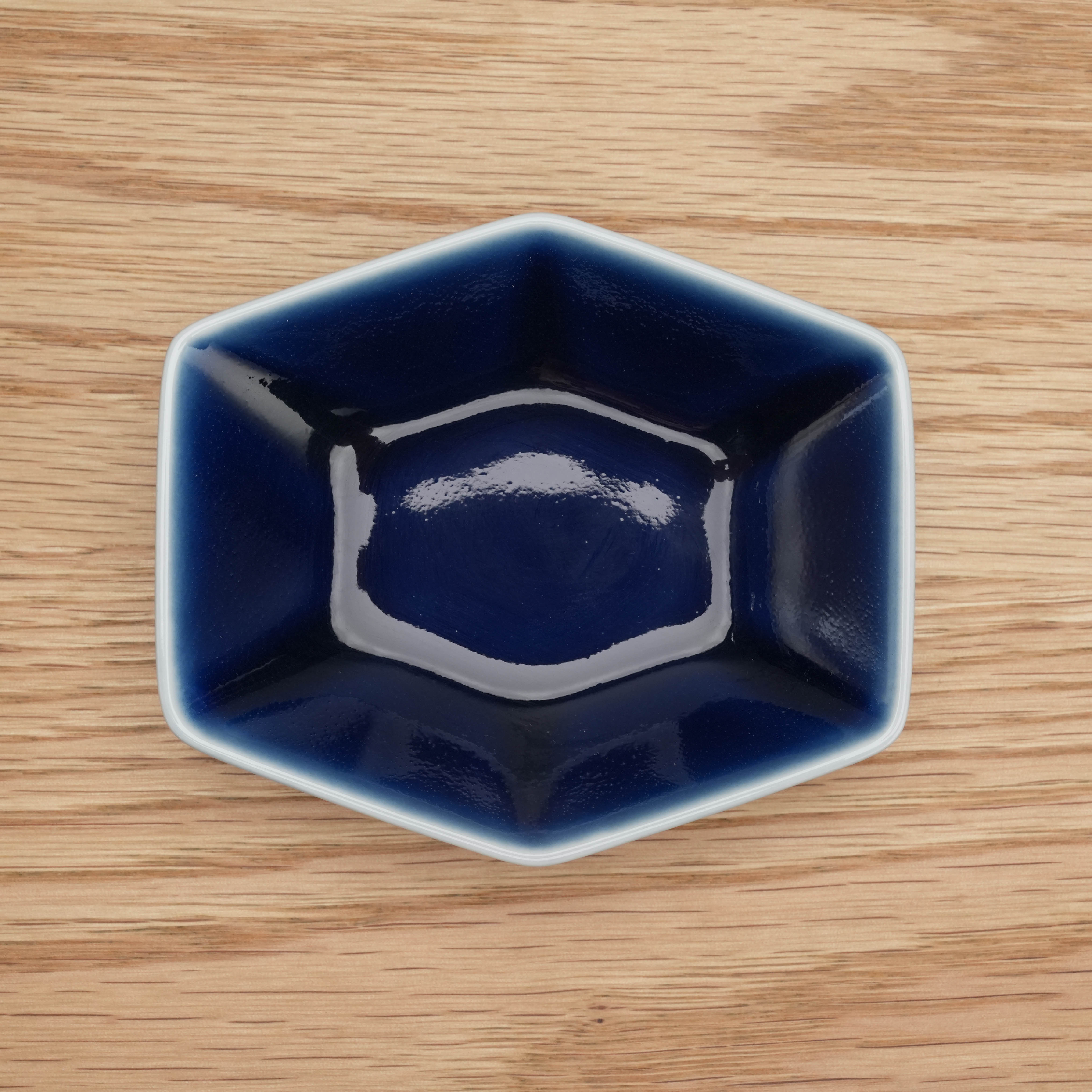 Top-down view of Navy blue Hakusan Kikkou Sauce Dish with tortoiseshell hexagonal design, ideal for condiments or dipping sauces.