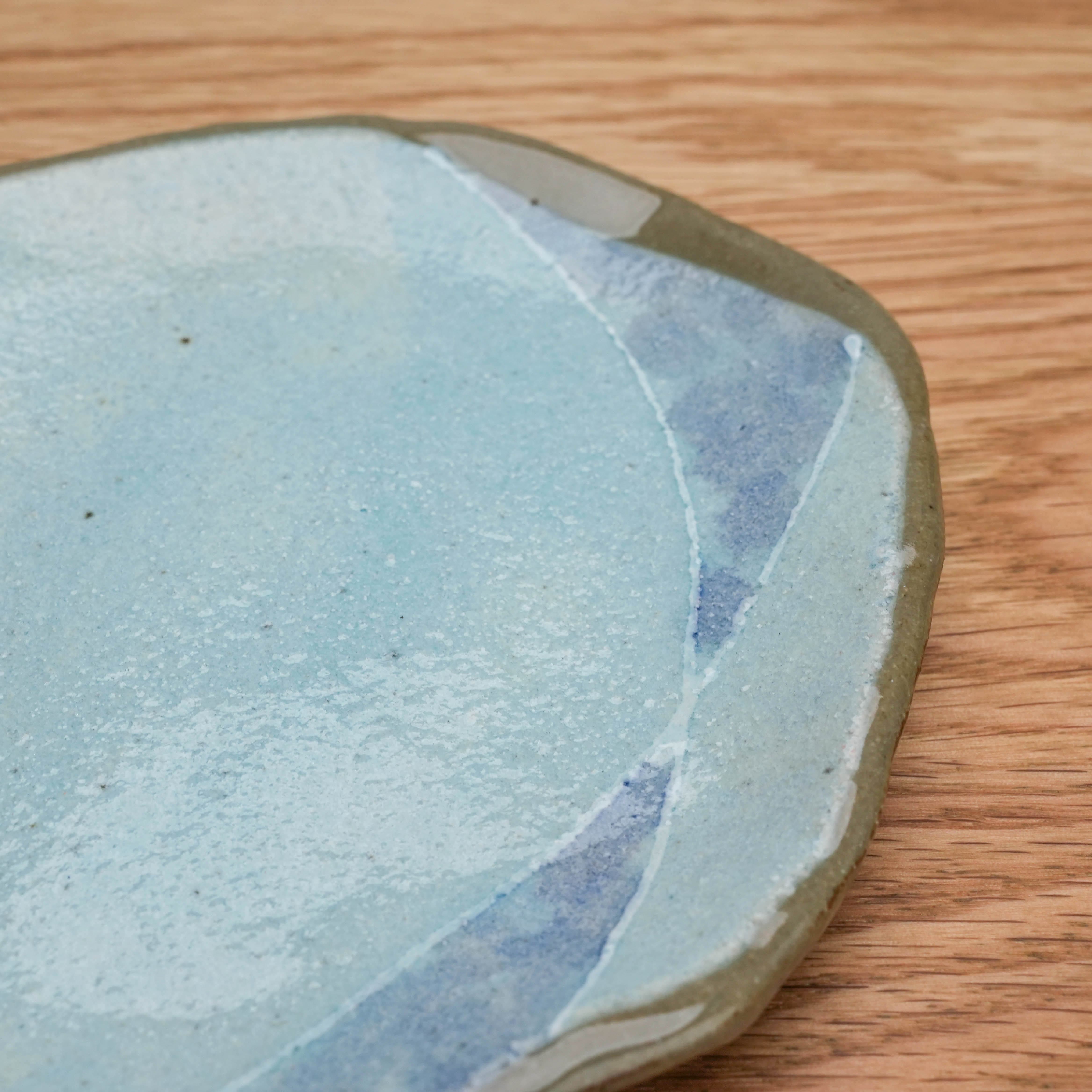 Detail of Tokiwa Mino Ware Cup & Saucer - Coffee Cup with Saucer | Handmade blue ceramic saucer with organic shape and subtle glaze variations.