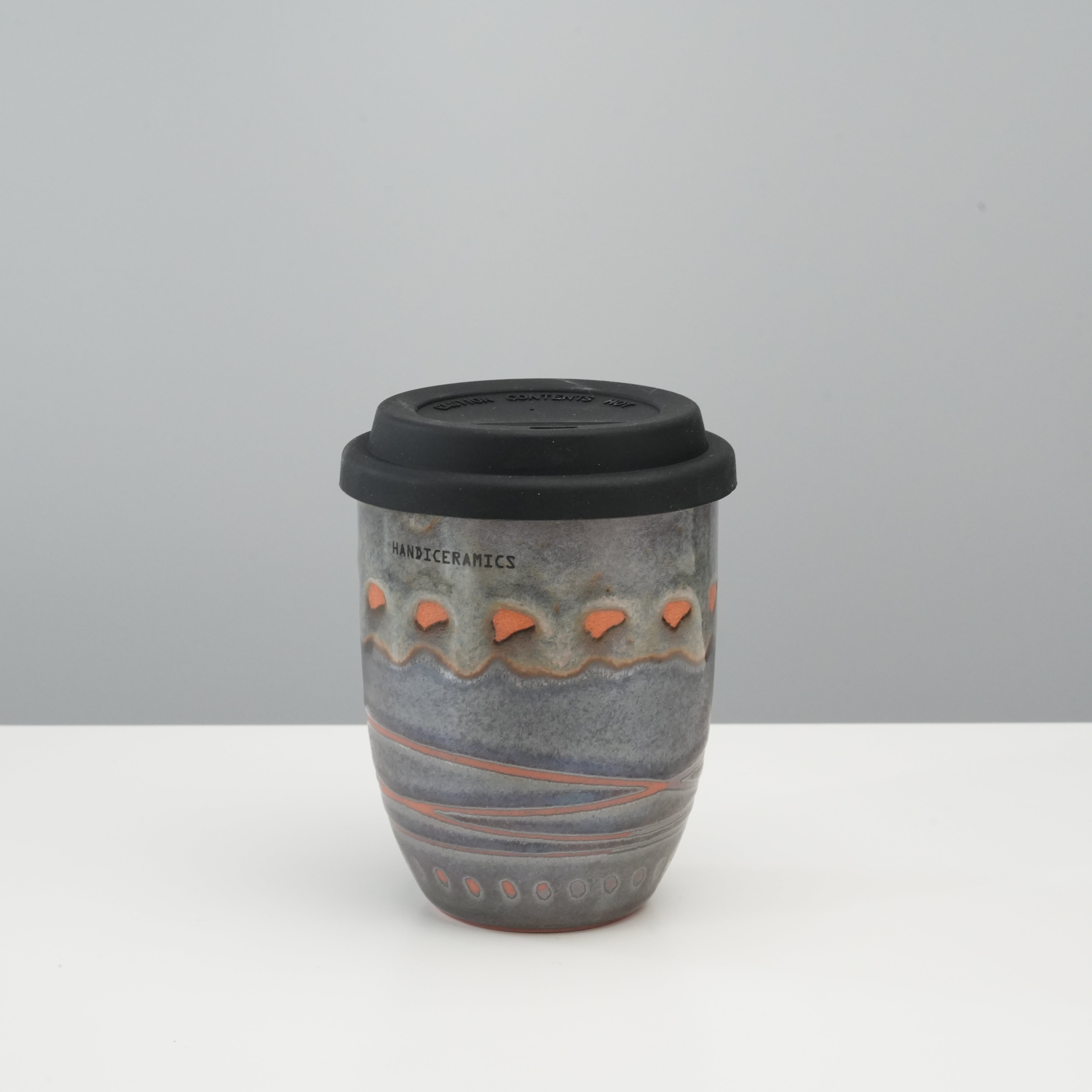 Tall version of Handiceramics Travel Cup - Ceramic Coffee Cup with Lid in Acorn Brownie, ideal for hot beverages on the go with artistic flair.