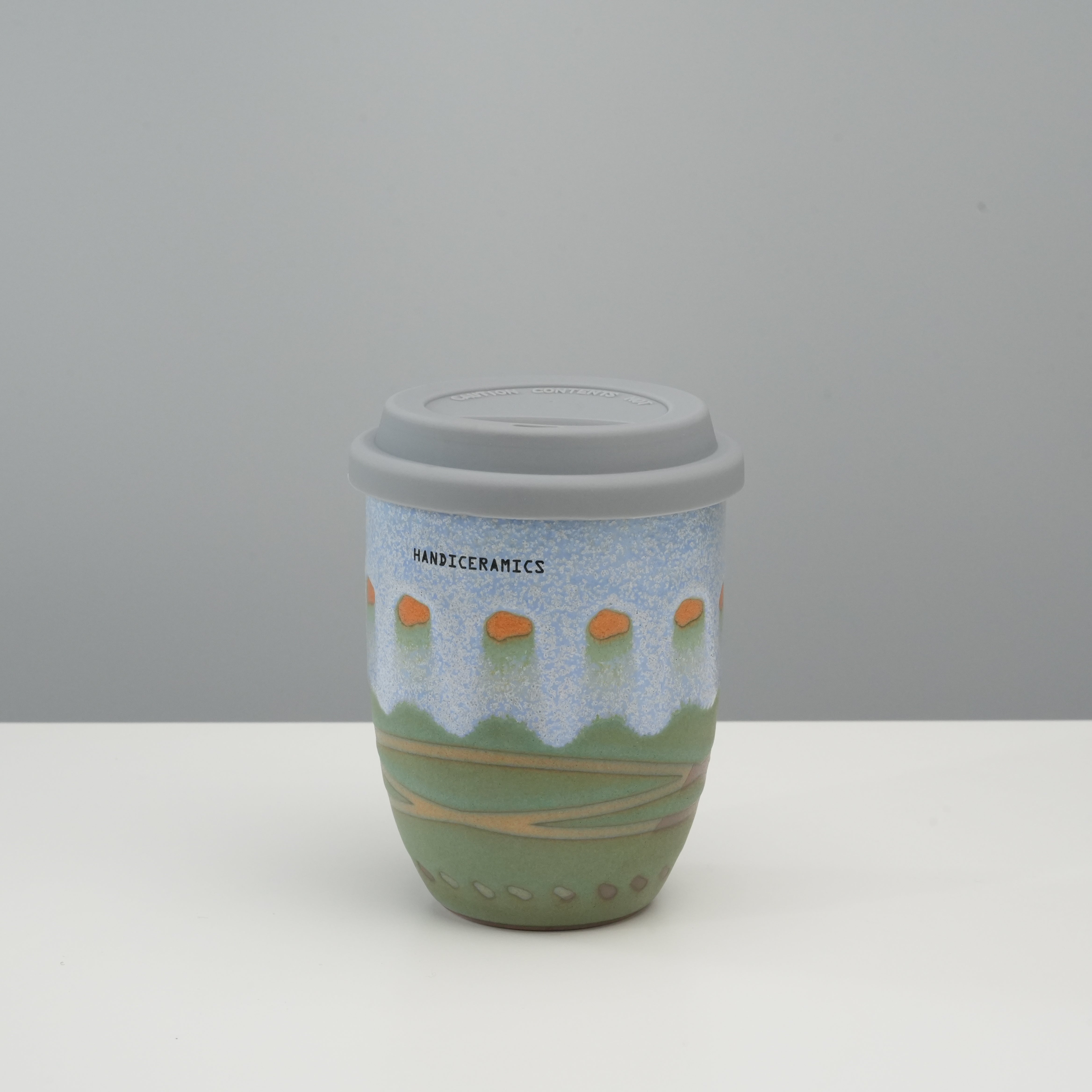 Tall version of the Handiceramics Travel Cup - Ceramic Coffee Cup with Lid | Palm Beach, featuring a scenic hand-painted design and snug lid.