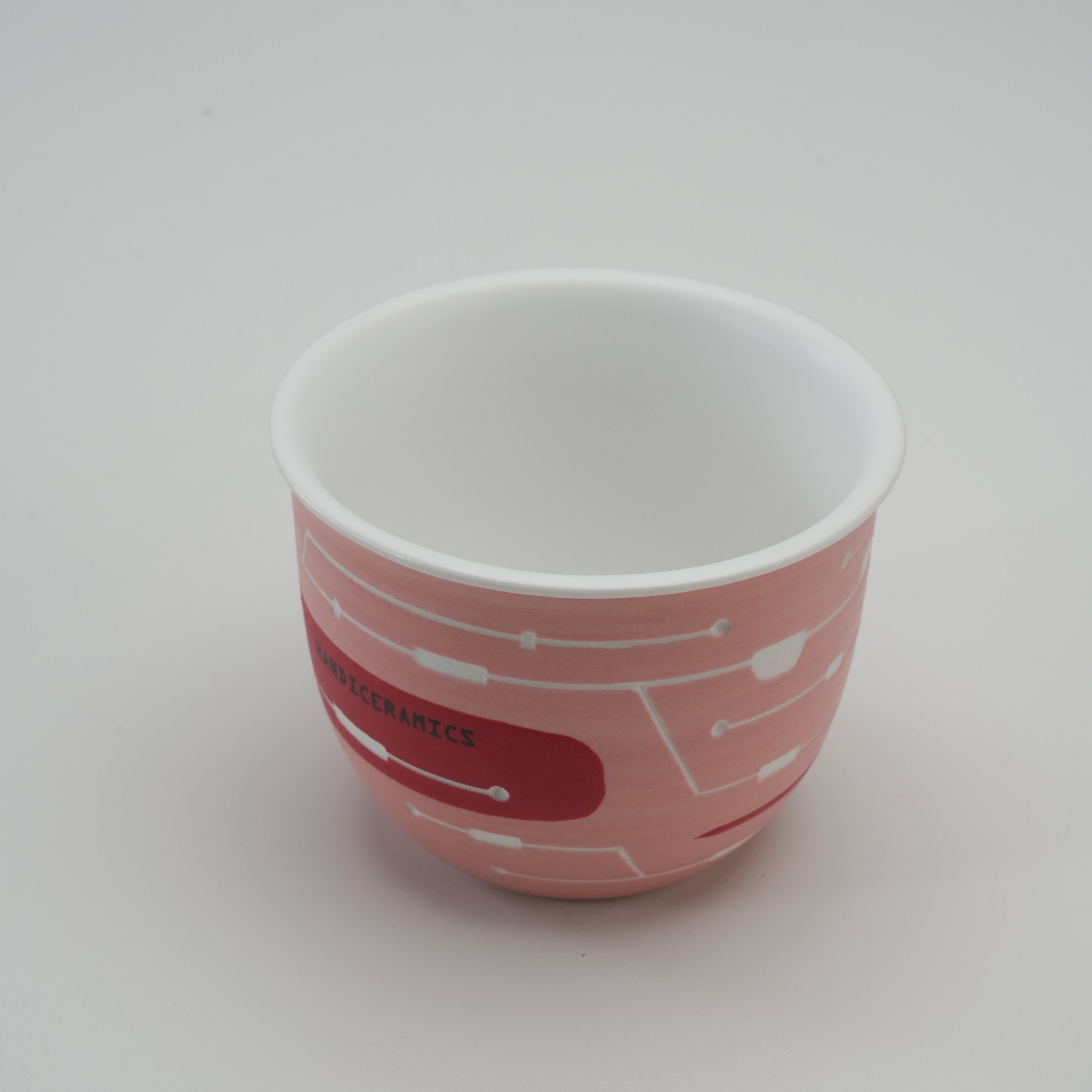Interior view of Handiceramics Travel Cup - Dragonfruit, highlighting the smooth white ceramic finish without the lid.
