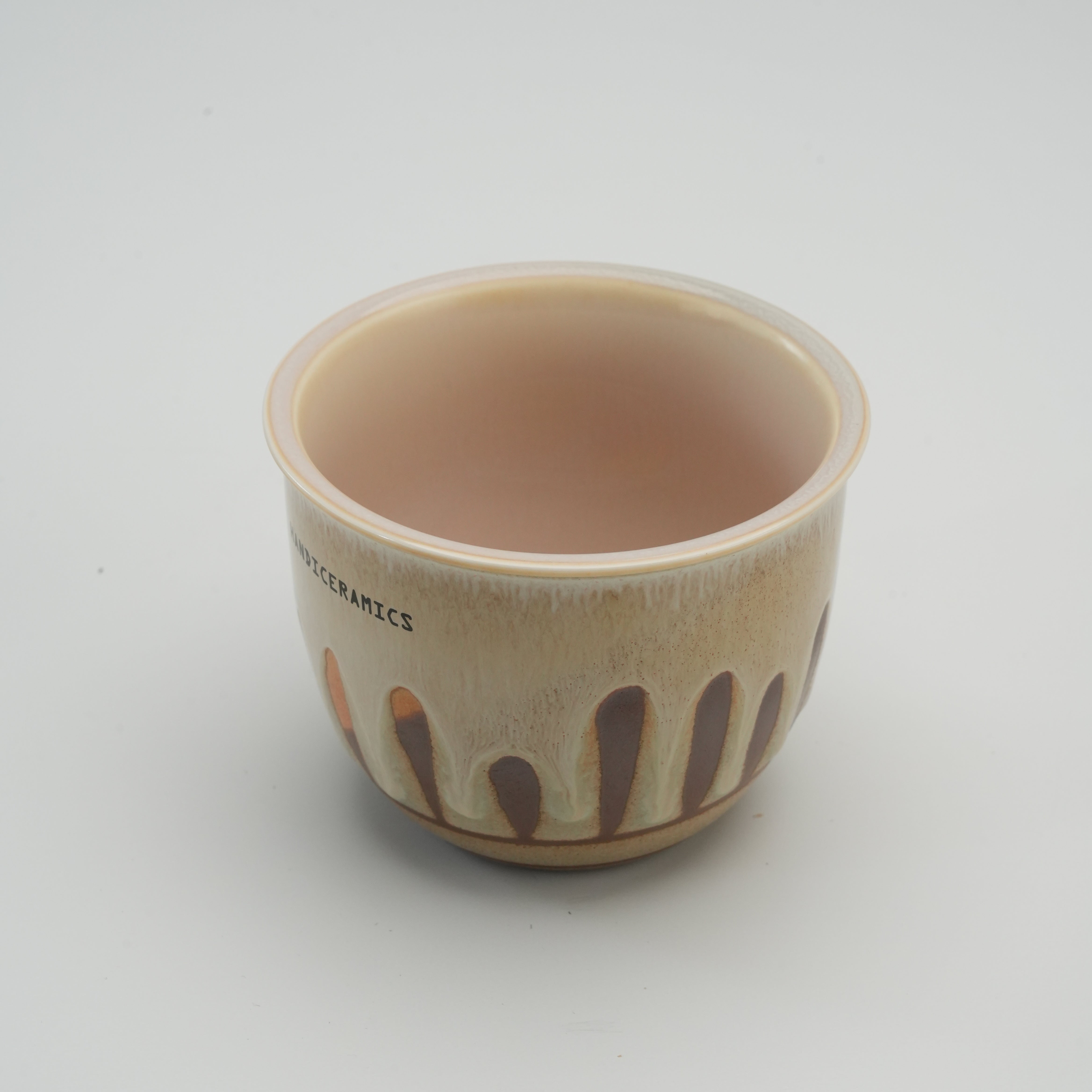 Interior view of Handiceramics Travel Cup without lid, revealing smooth high-fired porcelain finish ideal for coffee or tea.