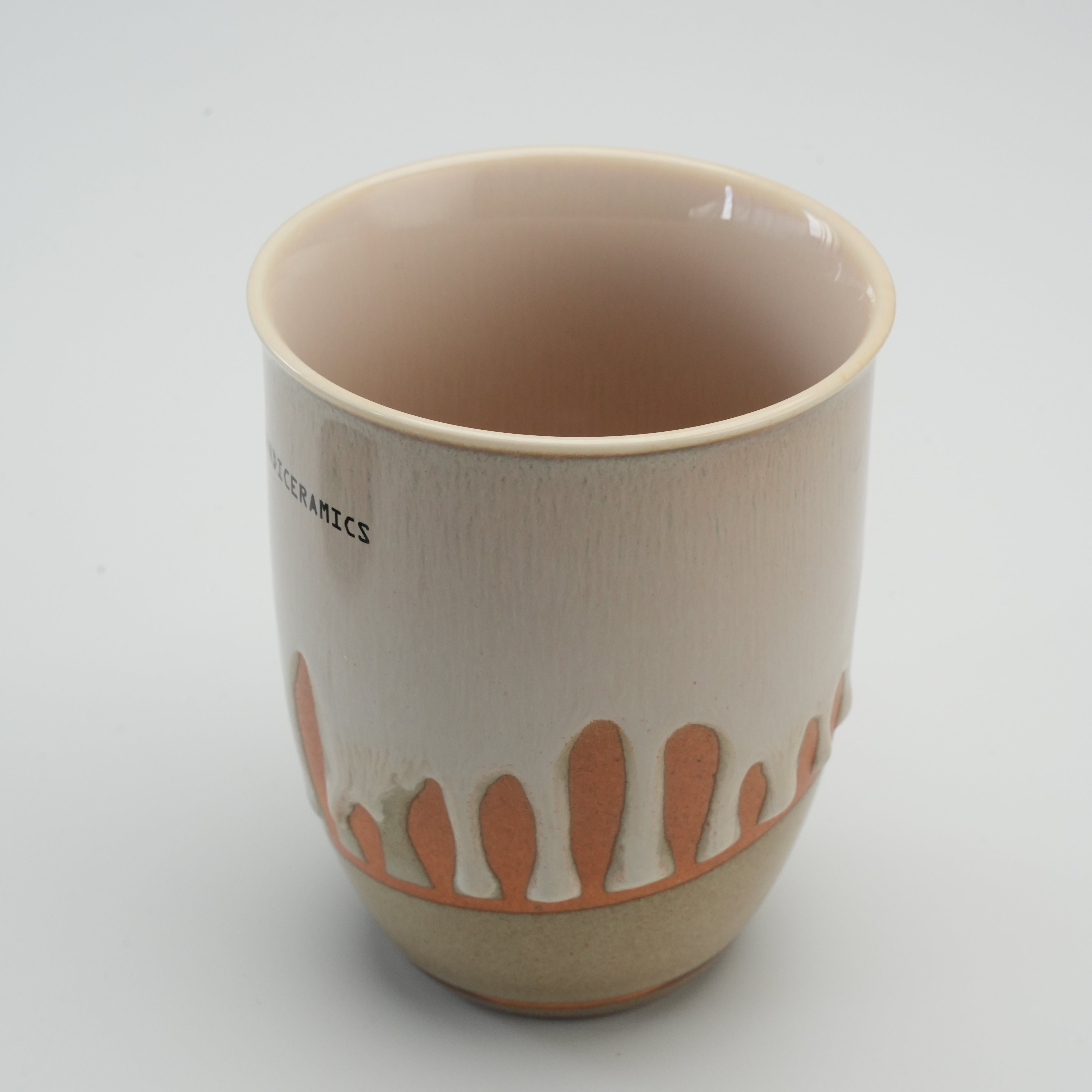 Open Handiceramics Boba Travel Cup showing glossy interior and artisan-crafted ceramic body, suitable for hot chocolate or tea.