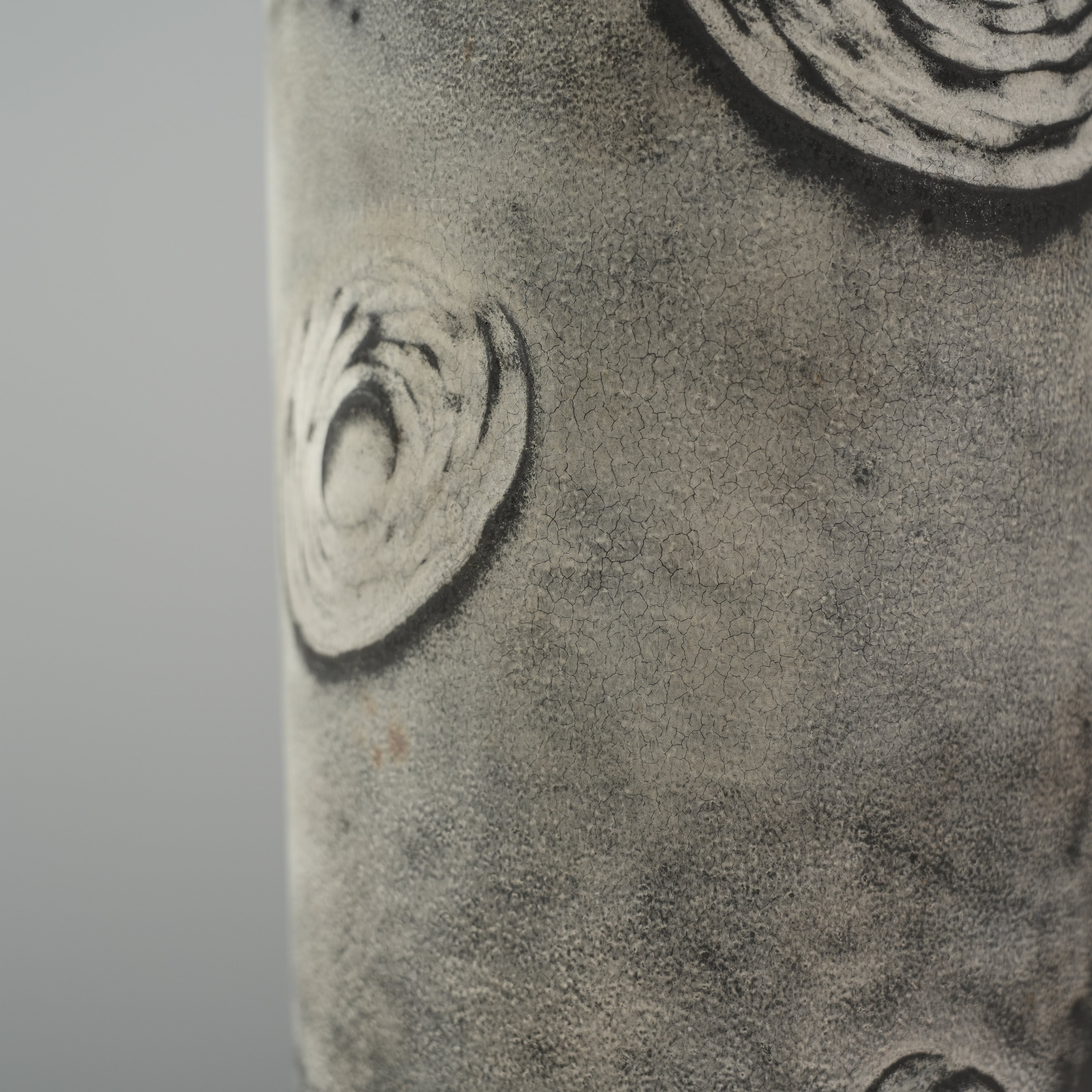 Detail of Lonesome Studio's Starry Night Vase highlighting crackled ceramic texture and hand-etched swirl patterns in silver glaze.