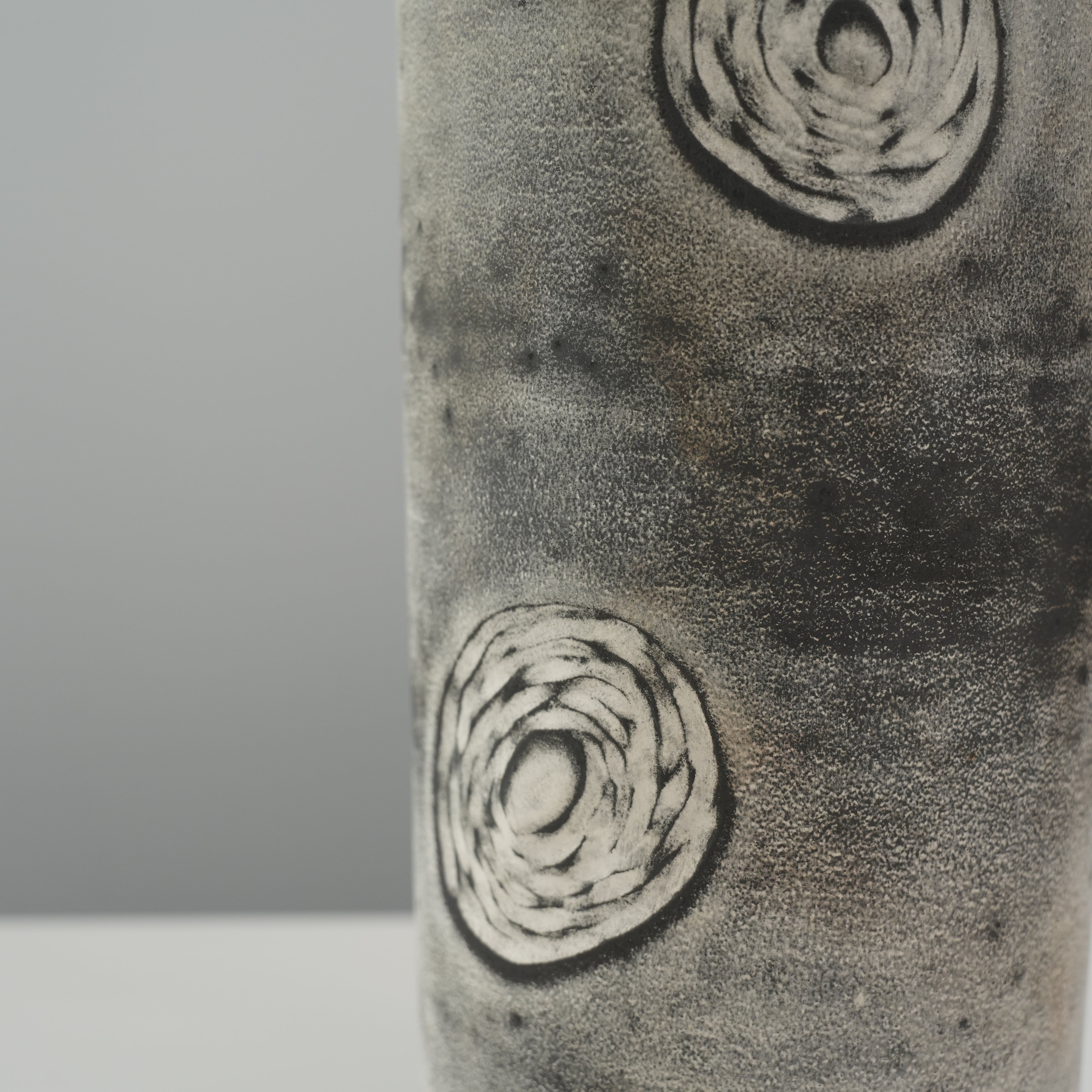 Close-up of Starry Night Cylinder Vase showing intricate swirl detailing and textured silver glaze finish for artistic home decor.