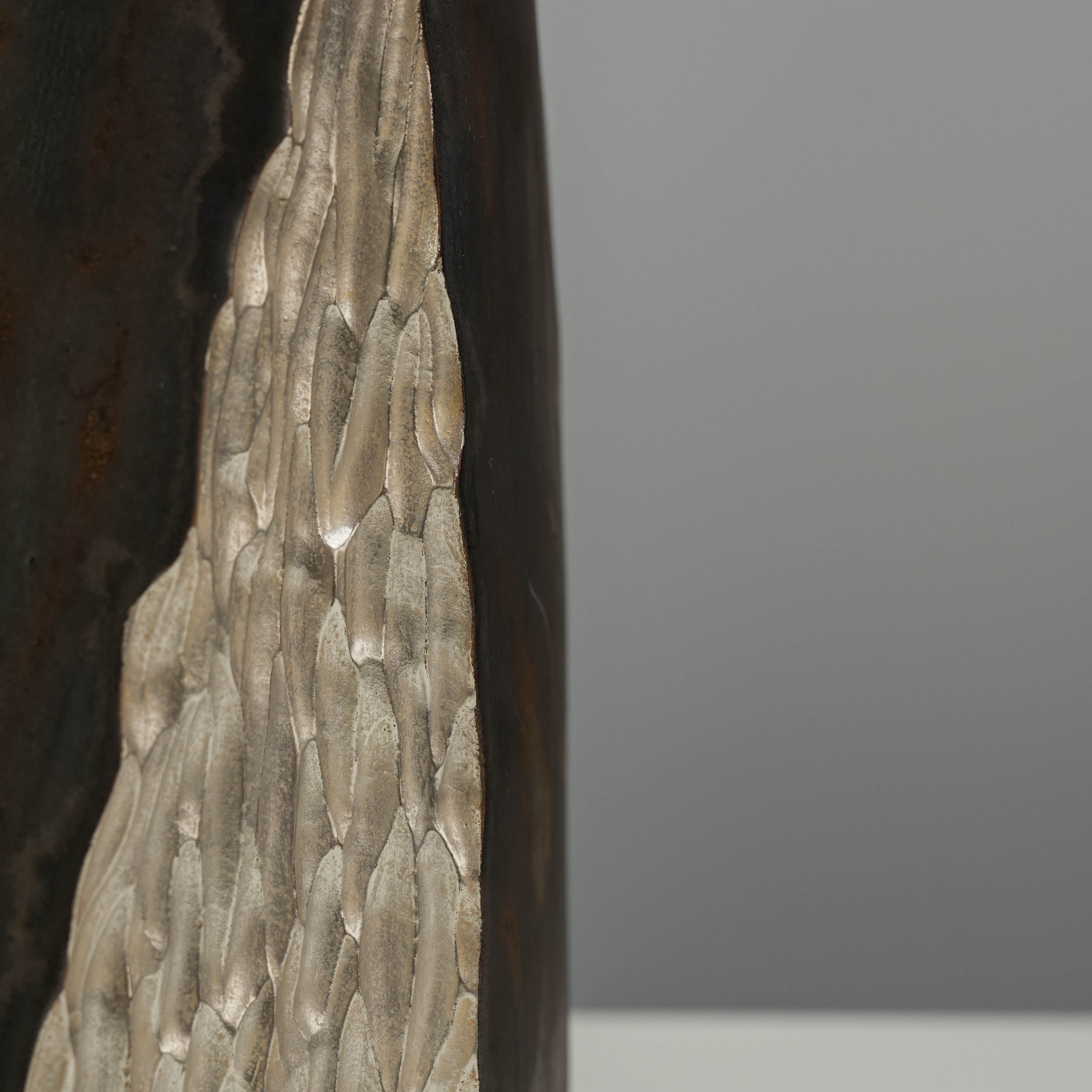 Close-up of silver textured glaze on the Lonesome Studio Vase, showcasing intricate craftsmanship and mountain-inspired design.