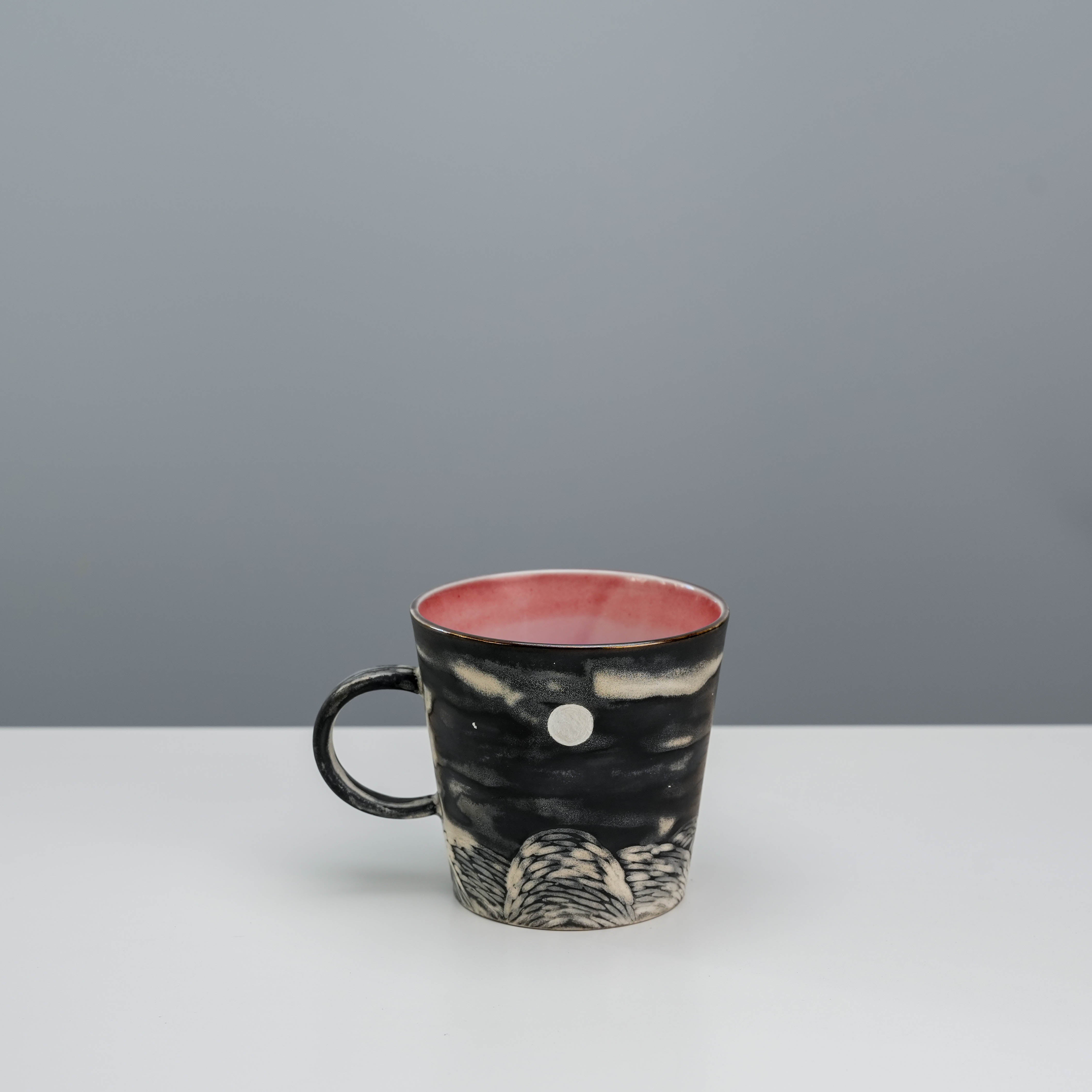 Full Moon Mug by Lonesome Studio featuring silver glazing and hand-carved moonlit landscape, ideal for coffee lovers and ceramic collectors.