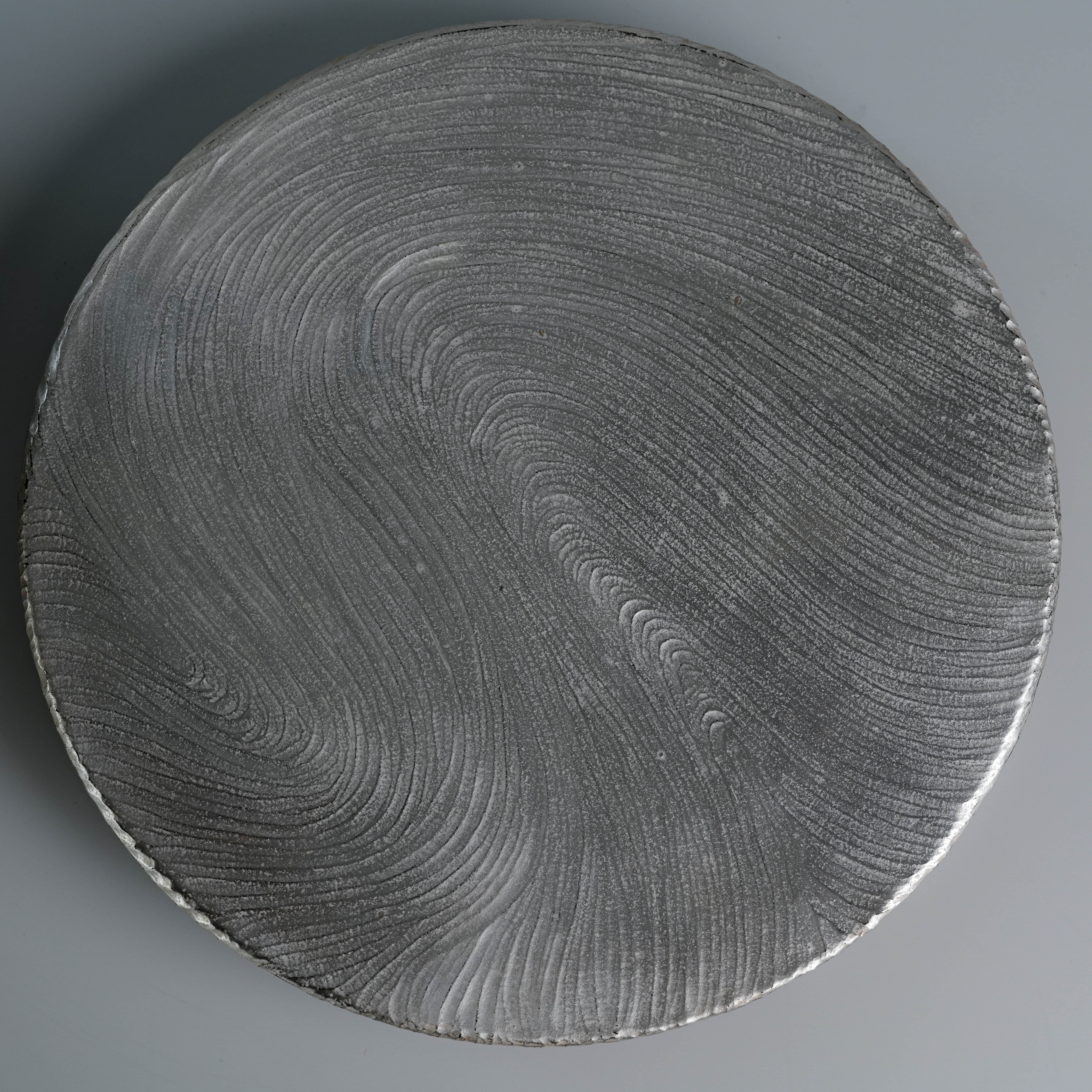 Top view of silver-glazed tray with circular textured pattern, part of Lonesome Studio Qushui handmade Gongfu Cha tea set.