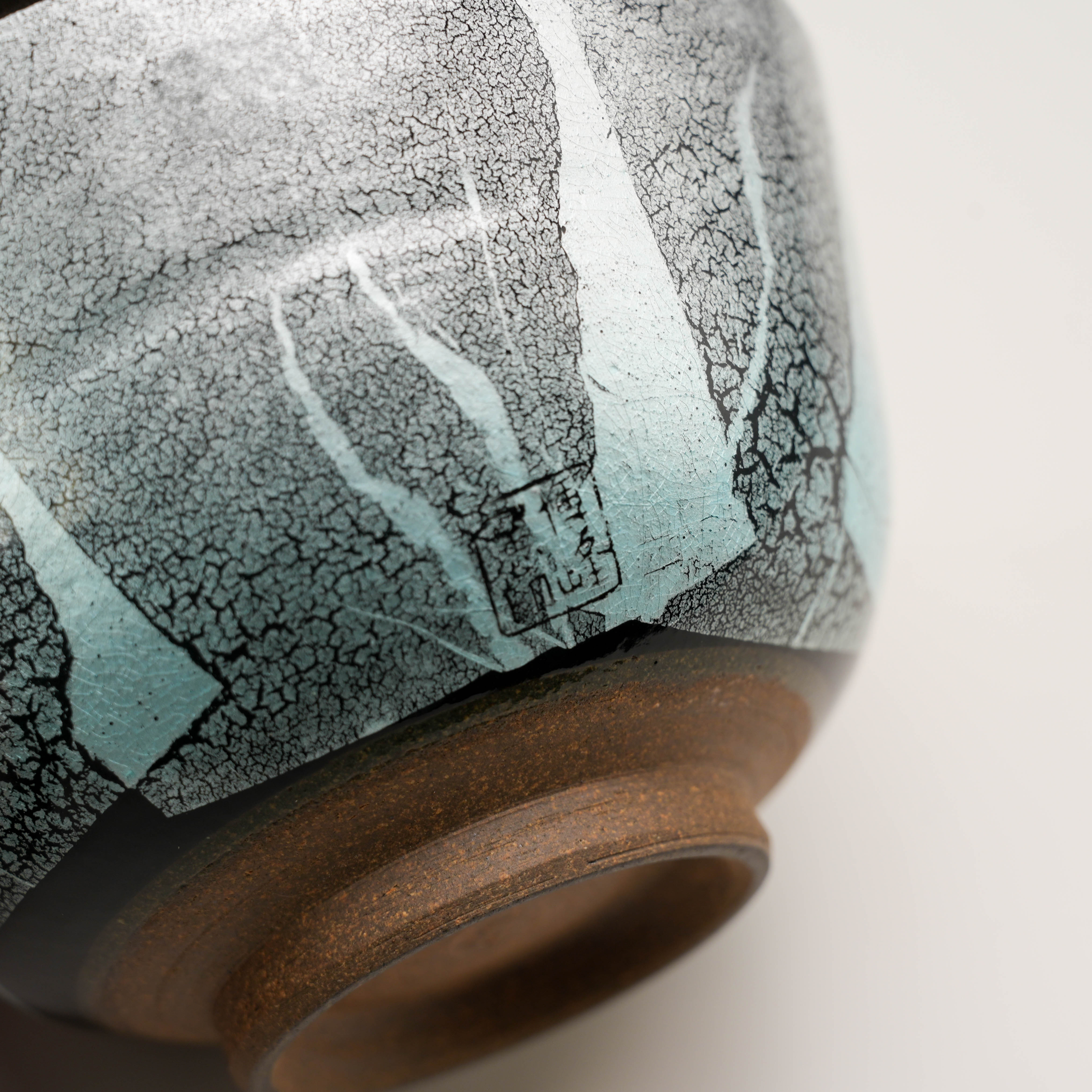 Detailed base of Kutani Ware Matcha Bowl highlighting textured silver foil design and artisan stamp, a collectible dinnerware piece.