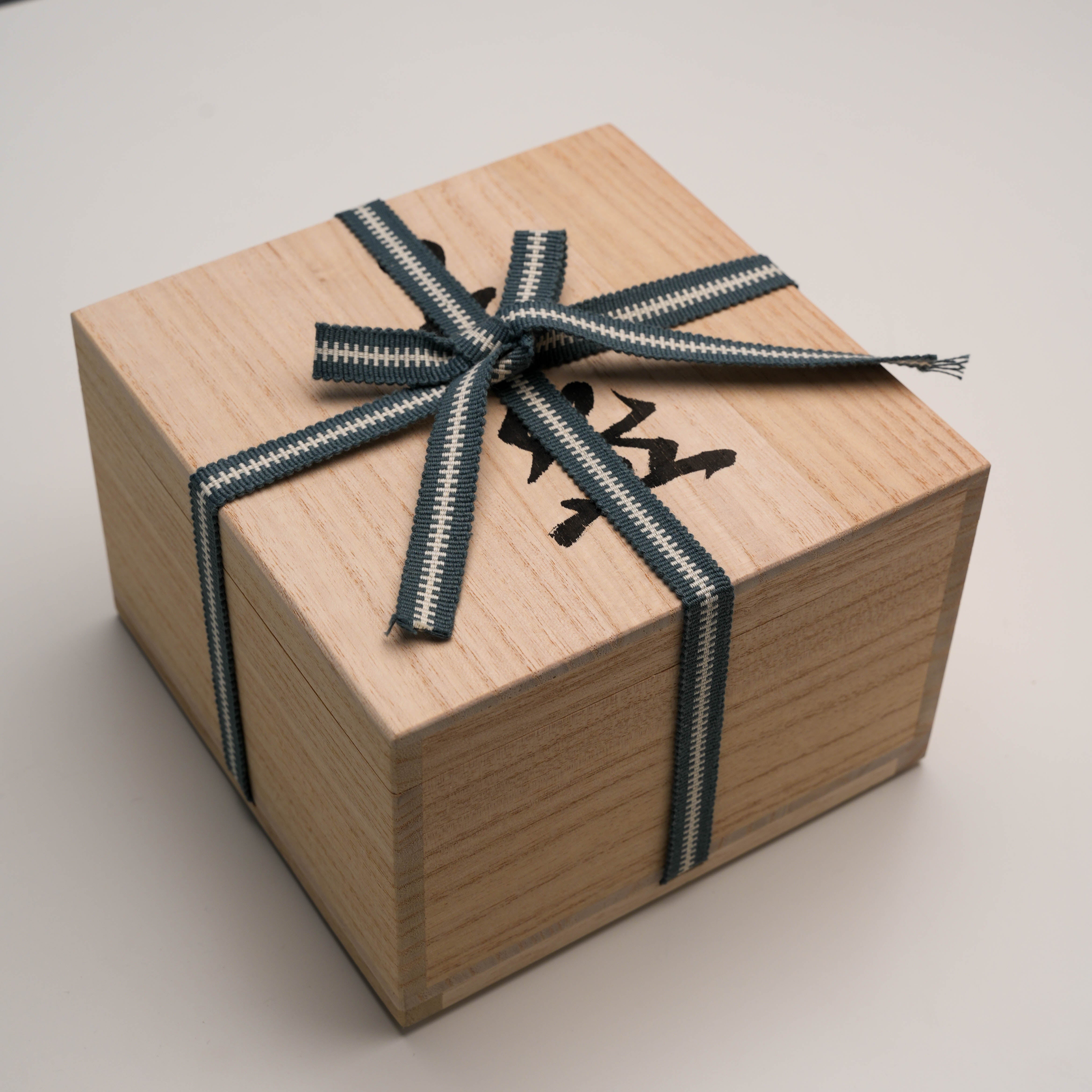 Wooden gift box with ribbon for Korean Karatsu Matcha Bowl - Arita Ware, enhancing its appeal as a premium handcrafted gift item.