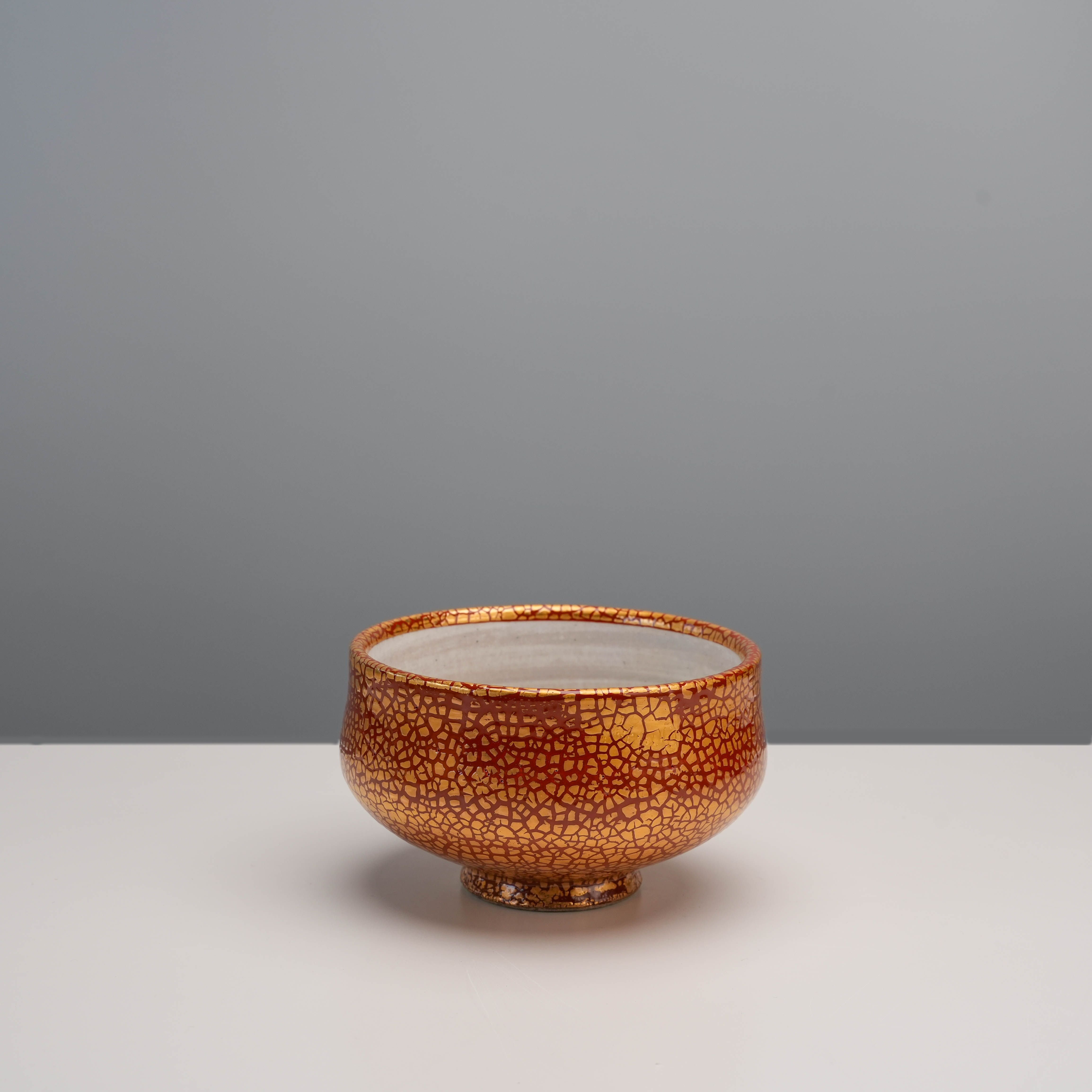 Arita Ware Vermilion Matcha Bowl with gold wrap detailing, ideal for matcha ceremonies. Traditional Japanese craftsmanship in elegant design.