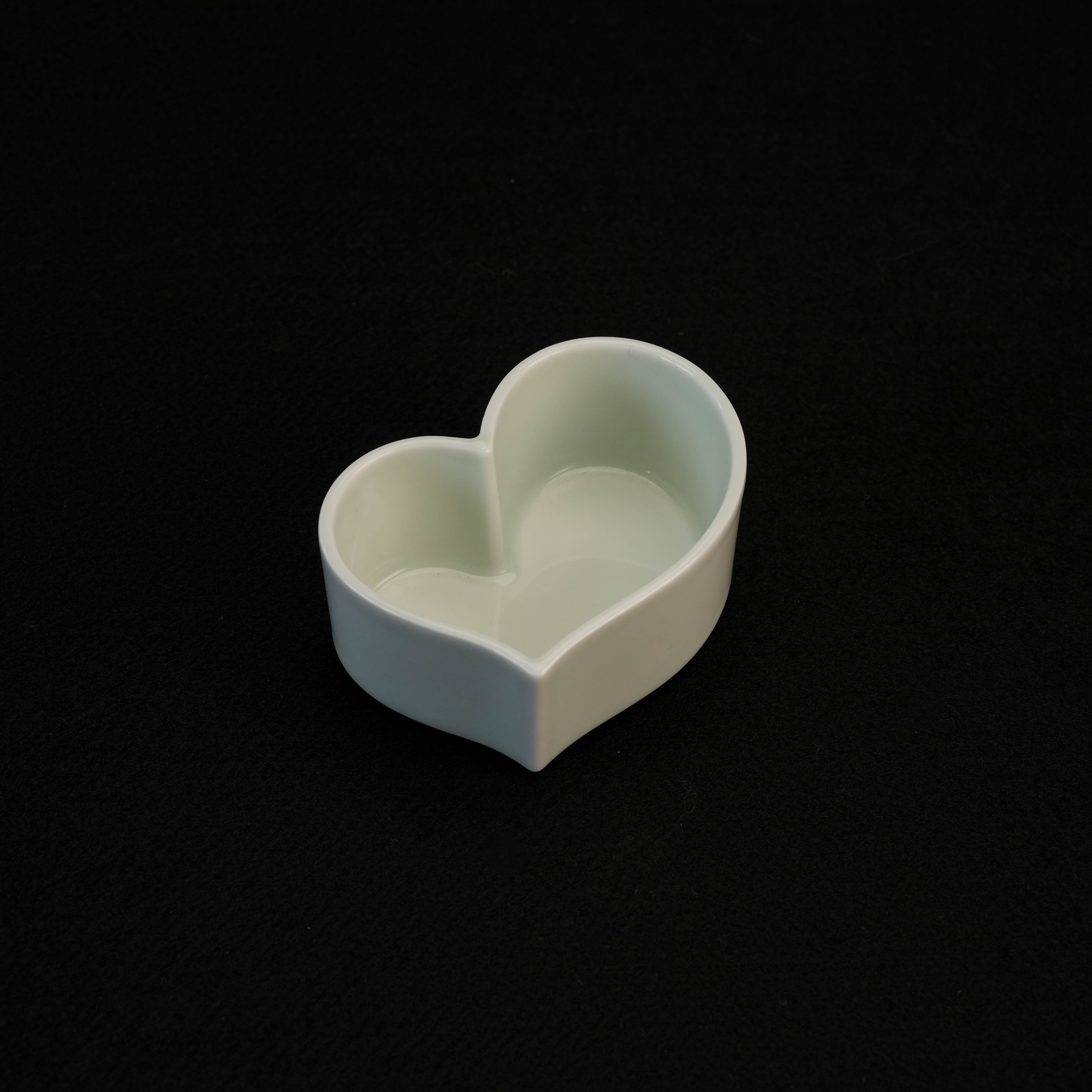 Interior view of Arita Ware Moon Rabbit Trinket Box - Keepsake Holder | Japanese Porcelain, showing smooth, heart-shaped ceramic compartment.