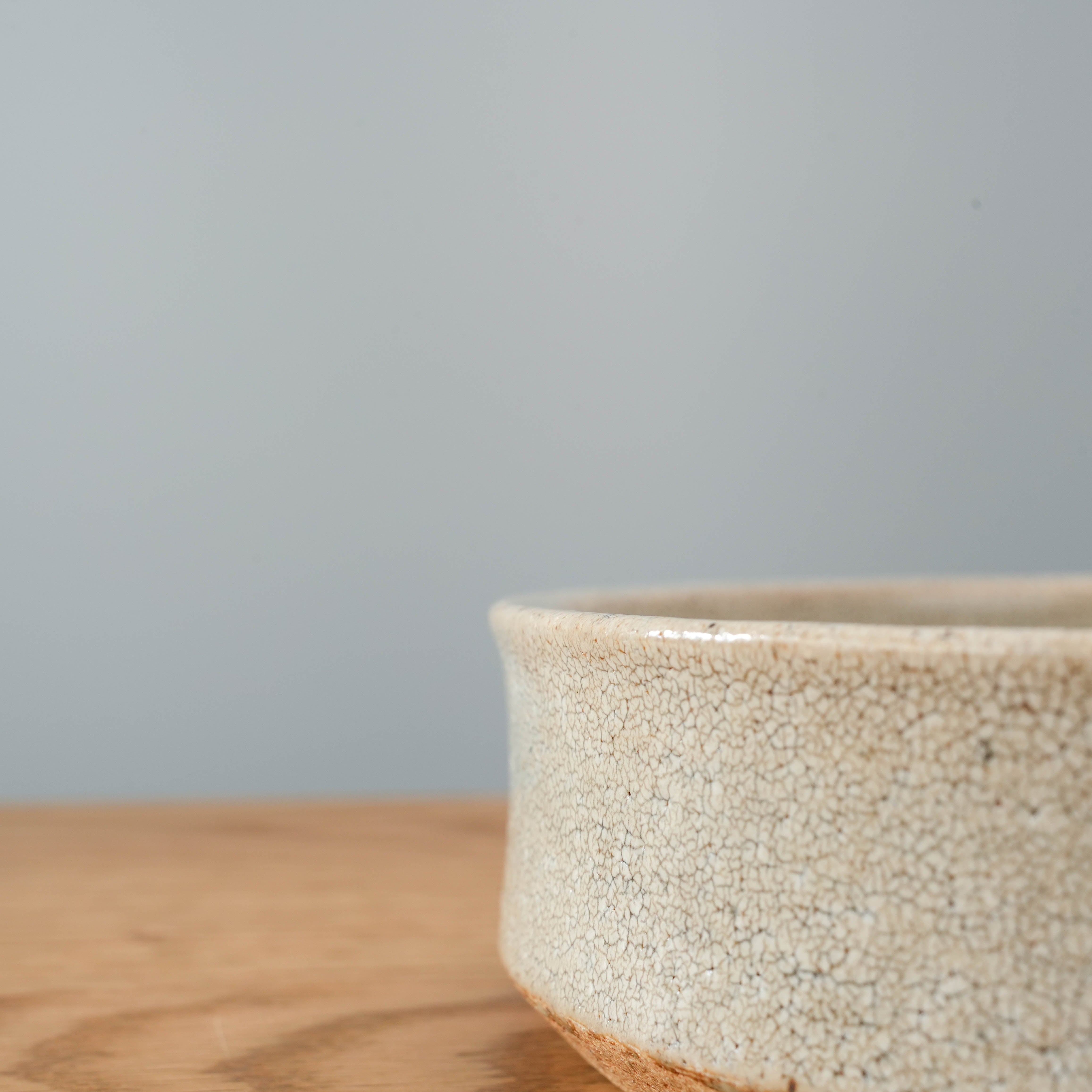 Detail view of the Mino Ware Sabi Kairagi Bowl's edge, emphasizing the handcrafted ceramic texture and natural glaze variation.