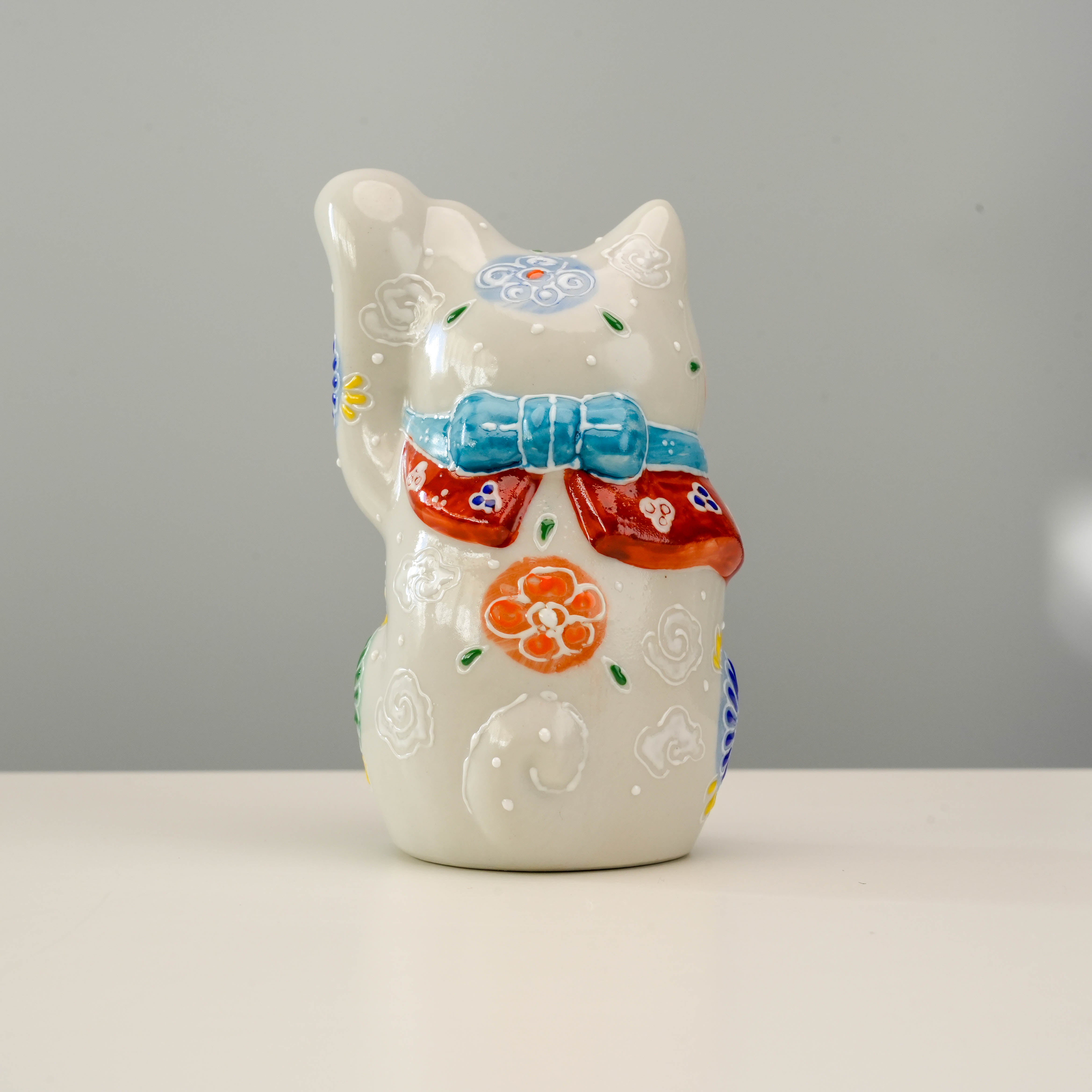 Back view of Kutani Cat Ornament - Lucky Cat showing detailed bow and floral motifs, perfect for elegant home and garden decor.