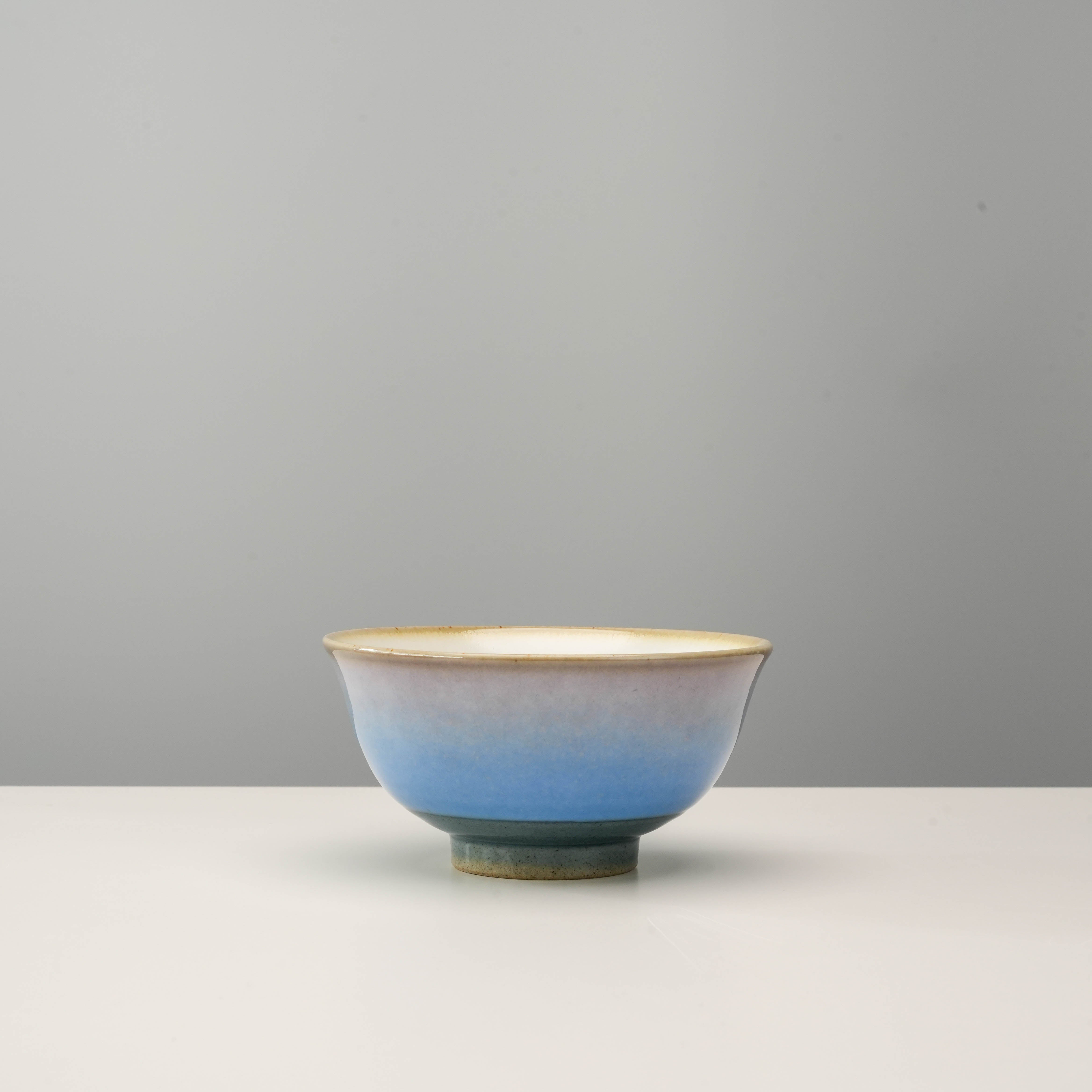 Blue-toned Kutani Ware Rice Bowl from the Yusai Glaze Set, showcasing traditional craftsmanship and a smooth gradient finish.