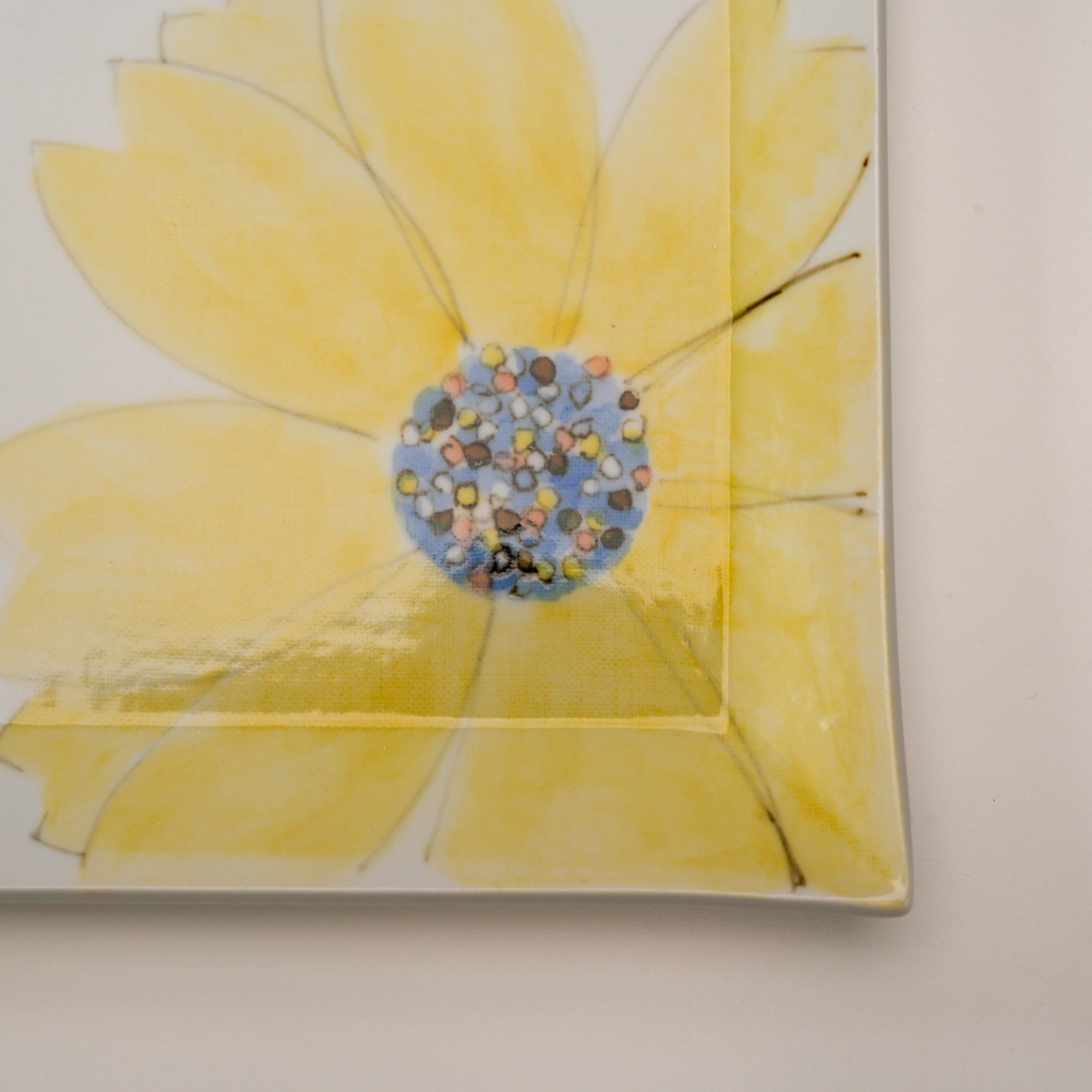 Corner detail of the Kutani Ware Serving Plate with yellow petal bloom, highlighting the fine brushwork and glossy ceramic finish.