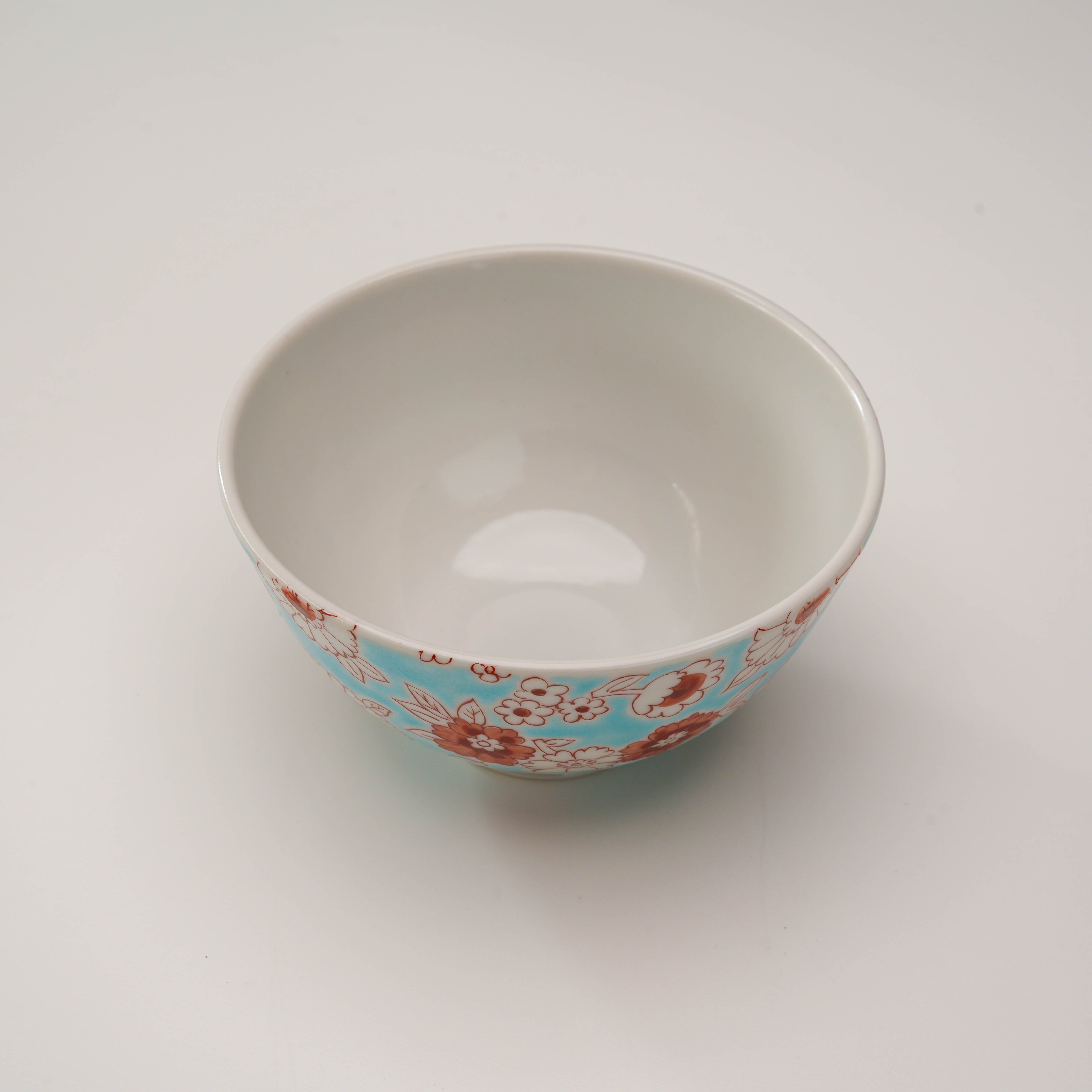 Top view of Kutani Ware Lightweight Rice Bowl with smooth white interior and colorful floral exterior, ideal for rice or small servings.