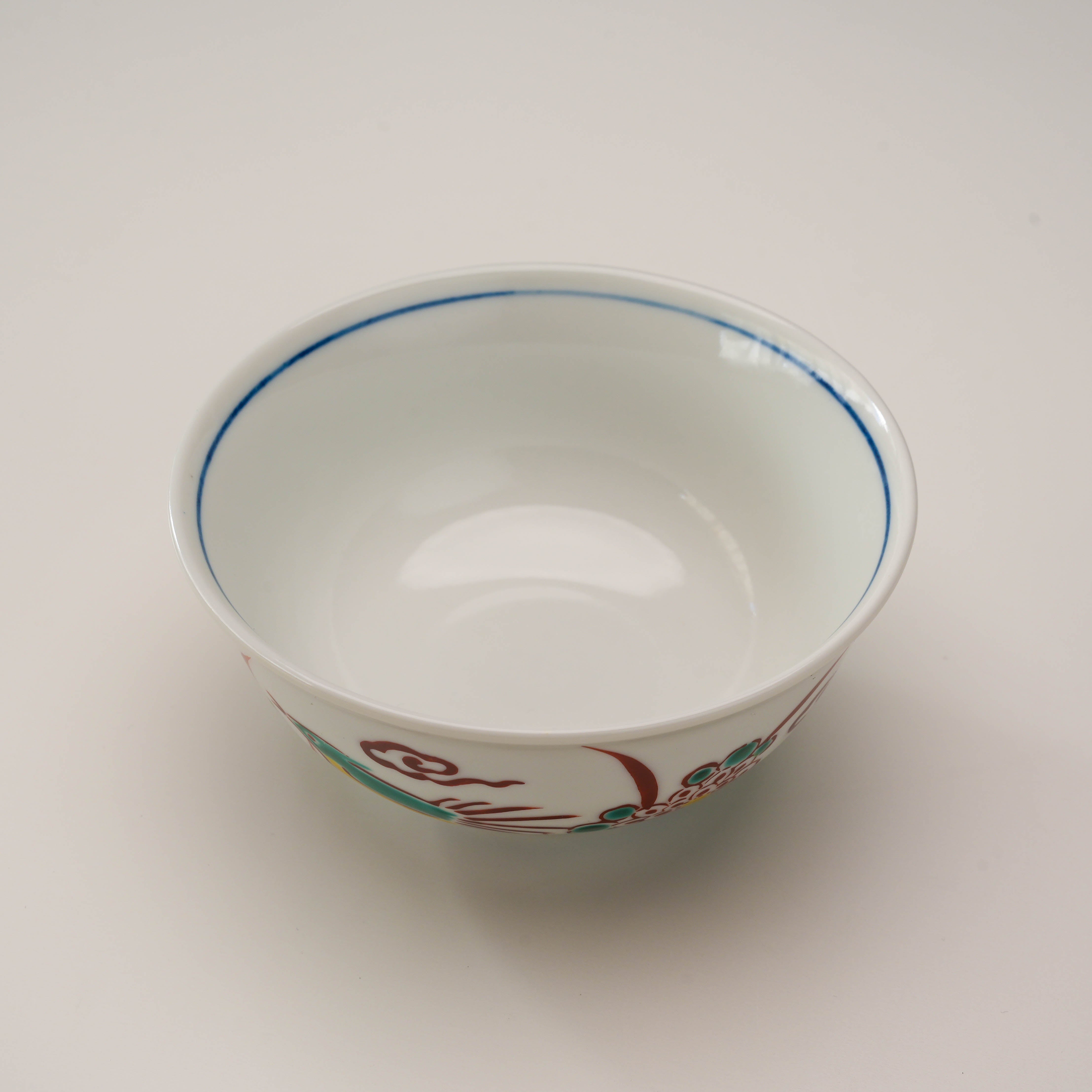 Top view of Kutani Ware Rice Bowl showing smooth white interior and blue rim, combining function with artistic elegance.