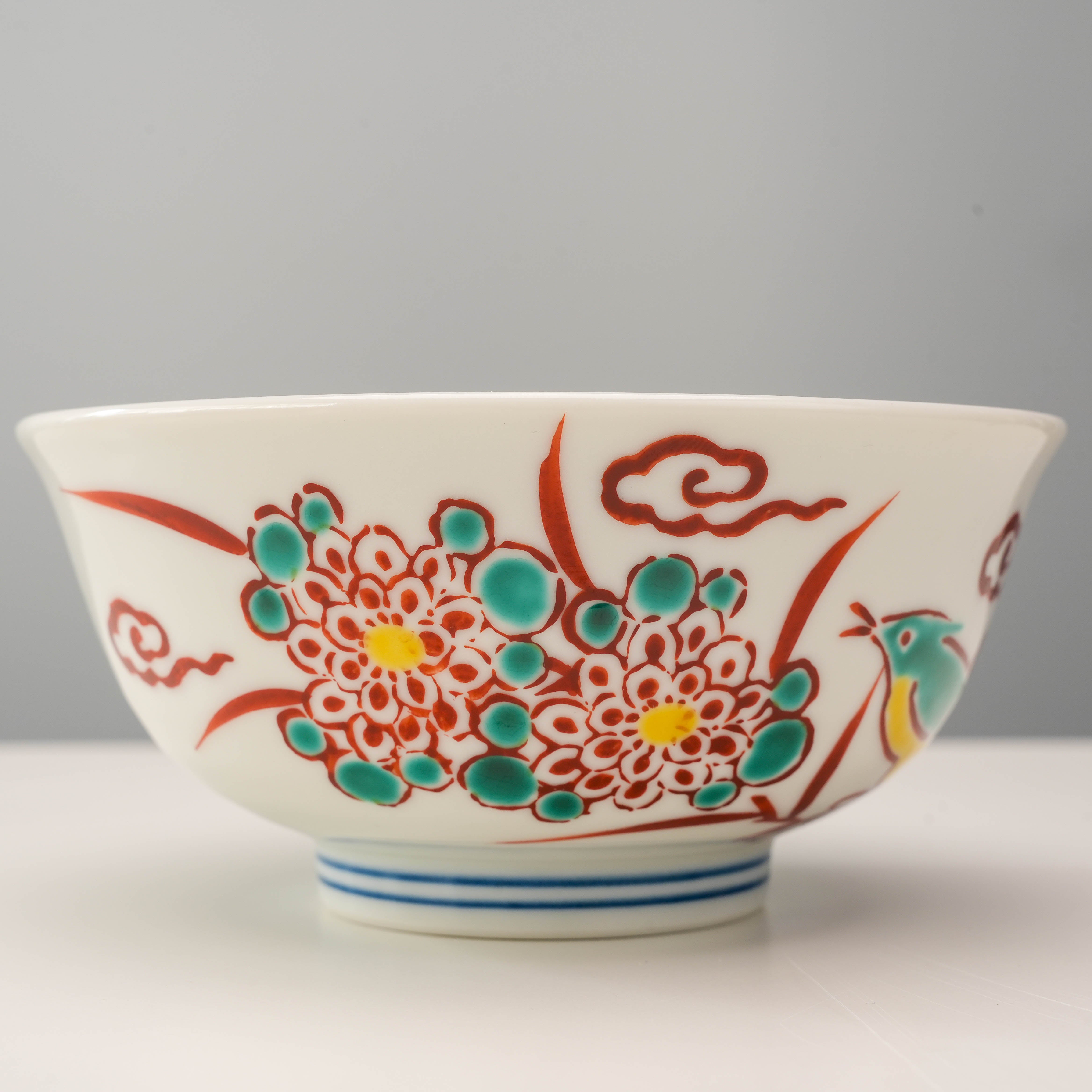 Detailed view of Kutani Ware Rice Bowl with vibrant chrysanthemum flowers and red bird, ideal for collectors or daily use.