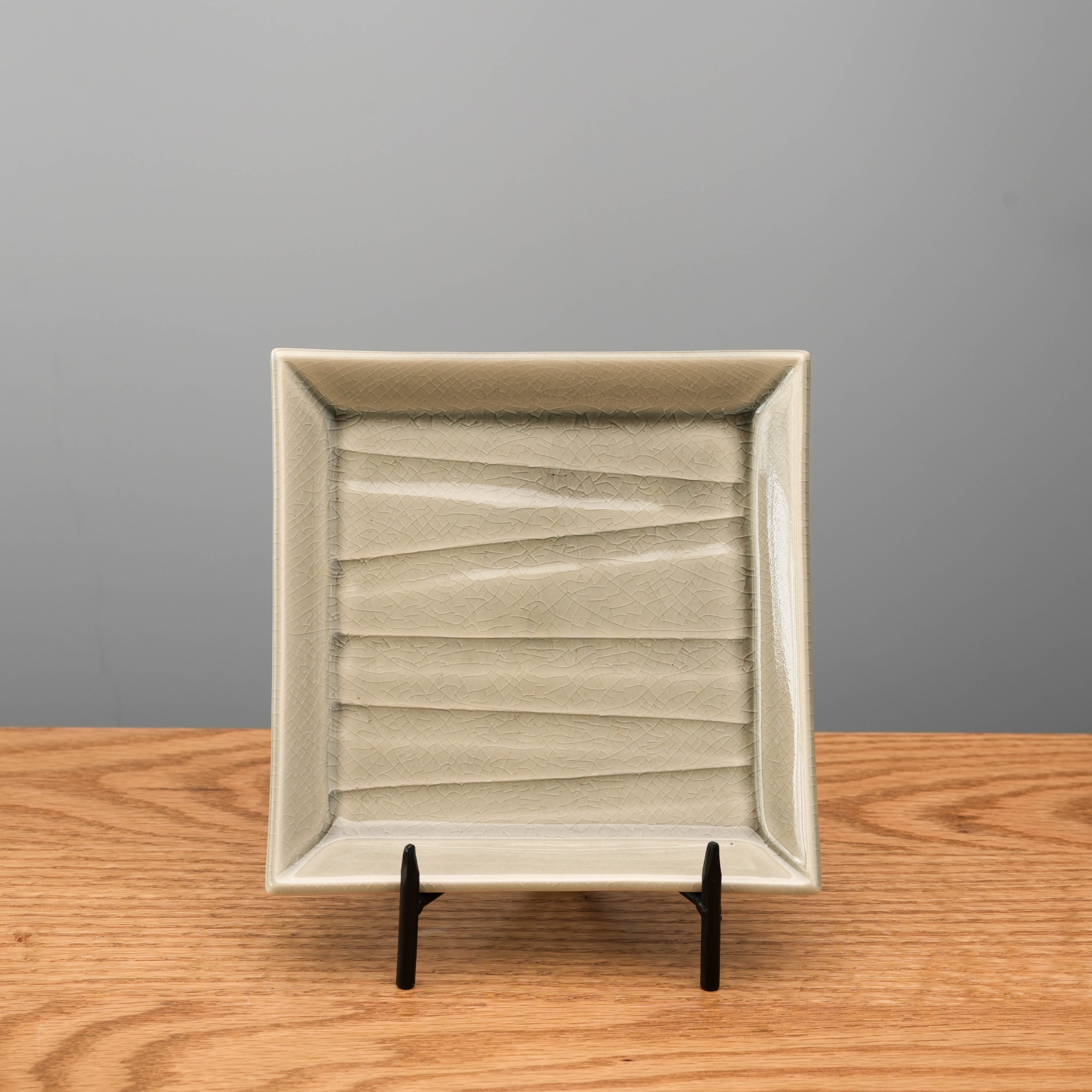 Crackle Glaze Grey Square Plate - Mino Ware displayed upright on wooden surface. Medium size plate ideal for appetizers or desserts.