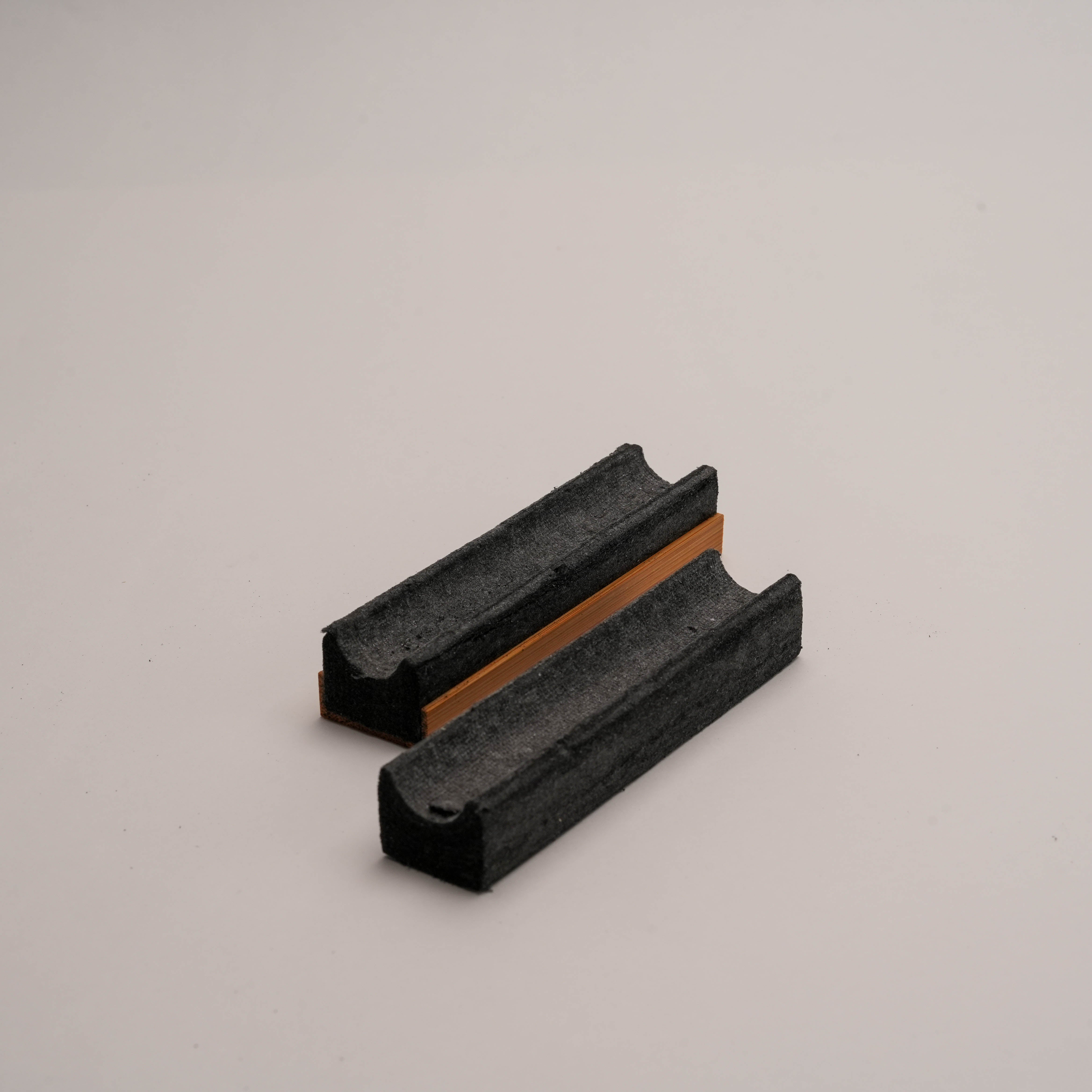 Short version of Shoyeido Takuba incense tray with felt insert removed, emphasizing its modular and minimalist design.