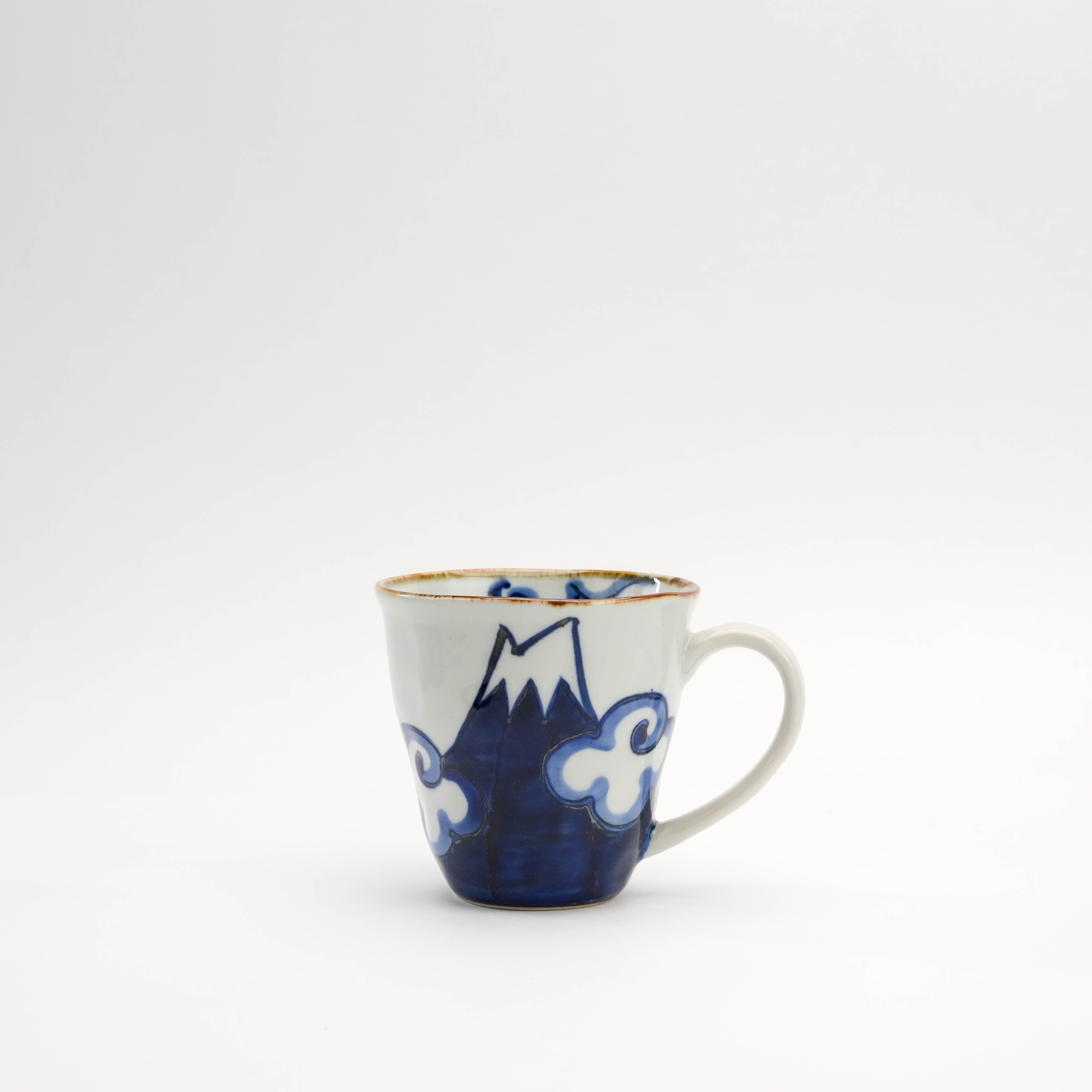 Blue Arita Ware Mt Fuji Mug with hand-painted Mt. Fuji and cloud design. Traditional Japanese drinkware with modern charm.