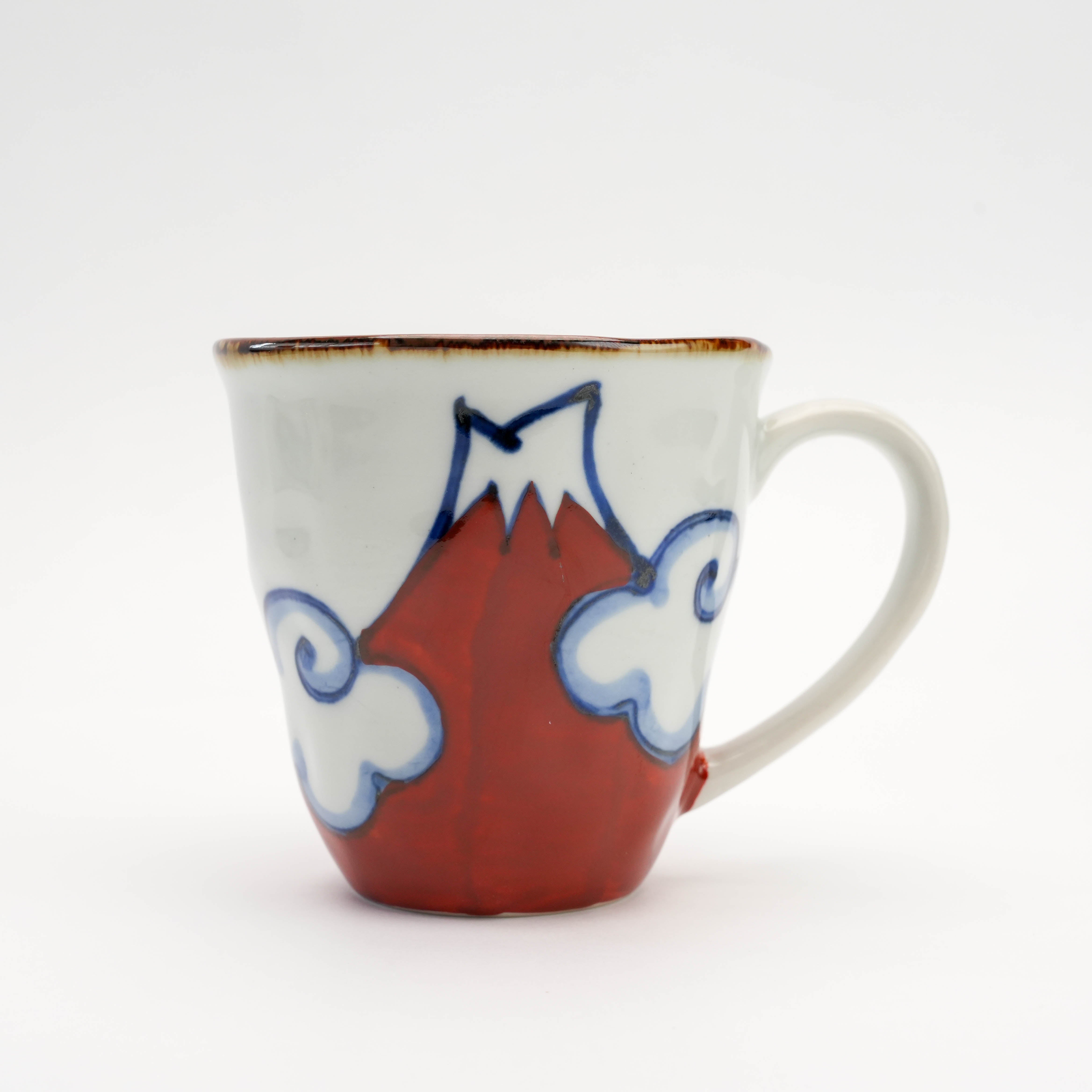 Close-up of red Arita Ware Mt Fuji Mug featuring detailed hand-painted Mt. Fuji and clouds. Ideal for collectors of Japanese mugs.