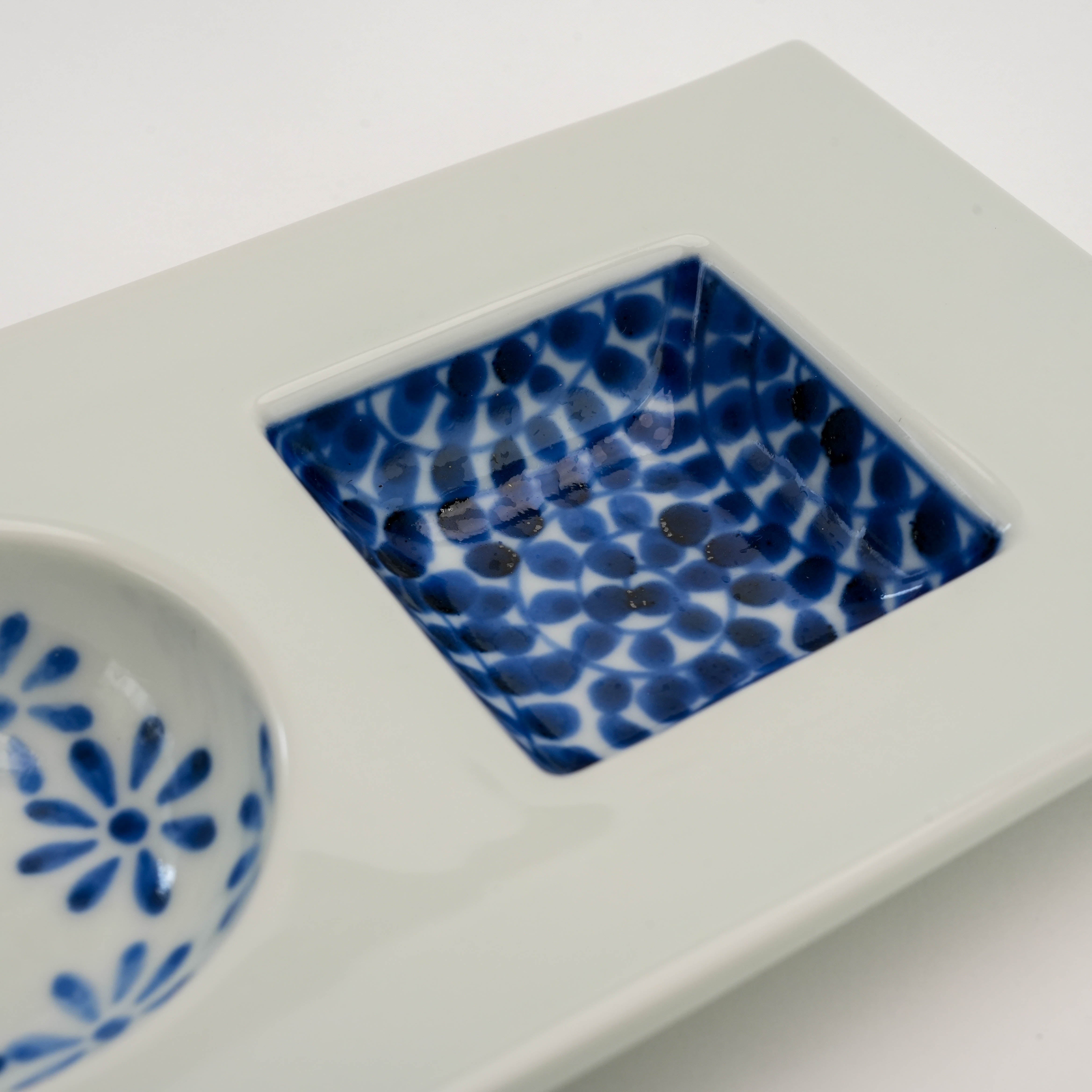 Dotted pattern detail in square compartment of Sometsuke Serving Dish, highlighting traditional Arita ware craftsmanship.