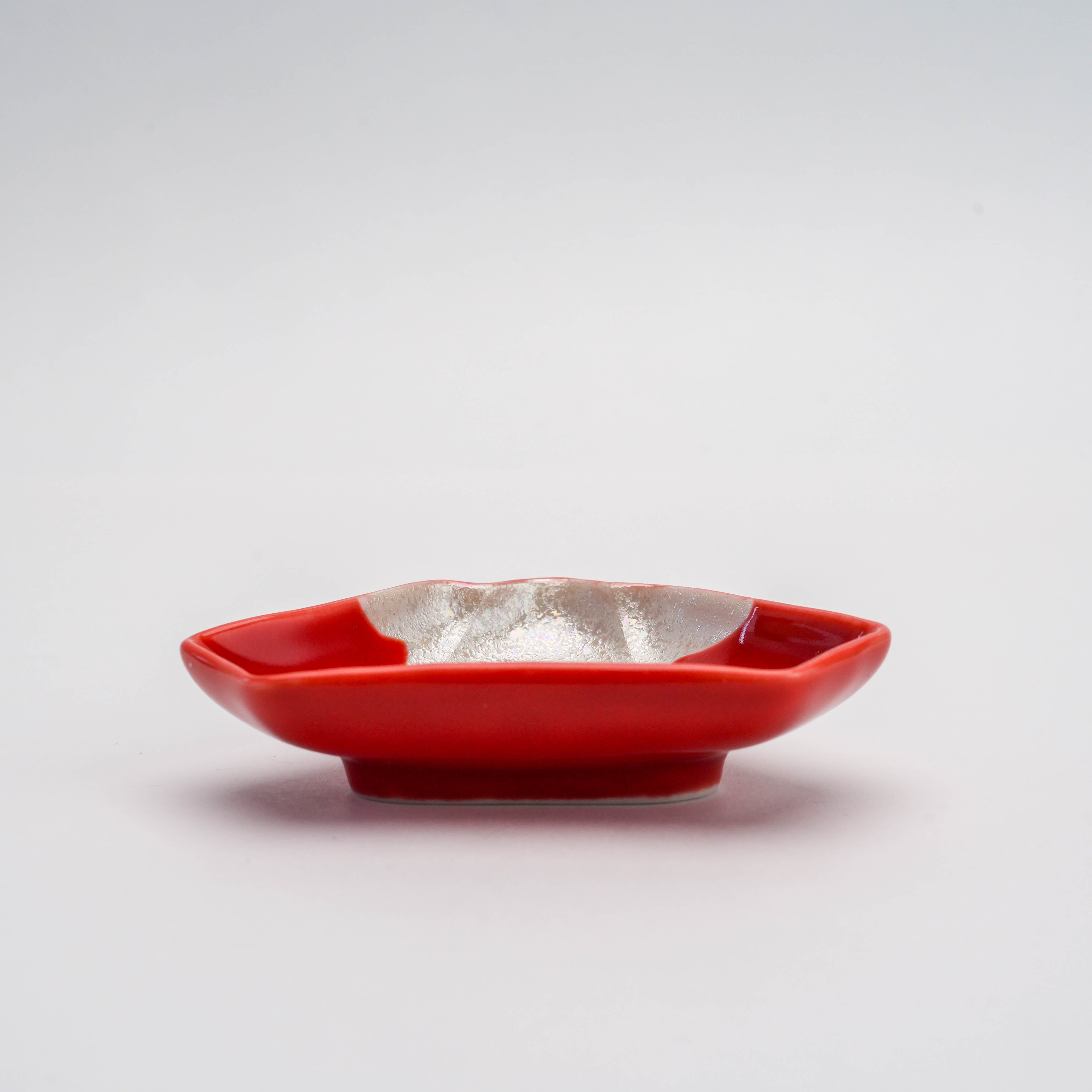 Side profile of Arita Ware Red Mt. Fuji Small Dish highlighting its shallow depth and elegant design, perfect for decor or small servings.