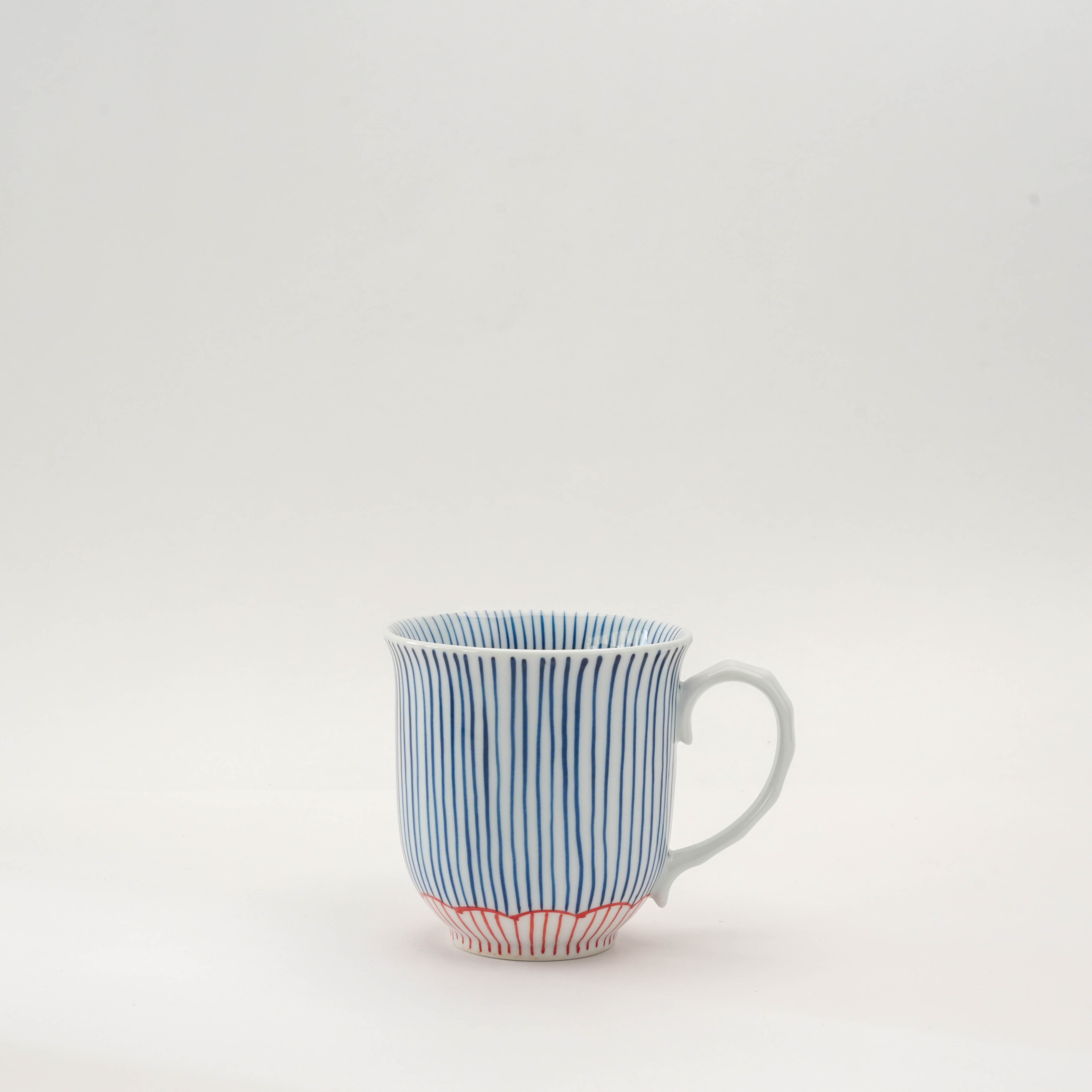 Single Arita Ware Japanese Mug with red-striped base and vertical blue lines, showcasing traditional Tokusa design craftsmanship.